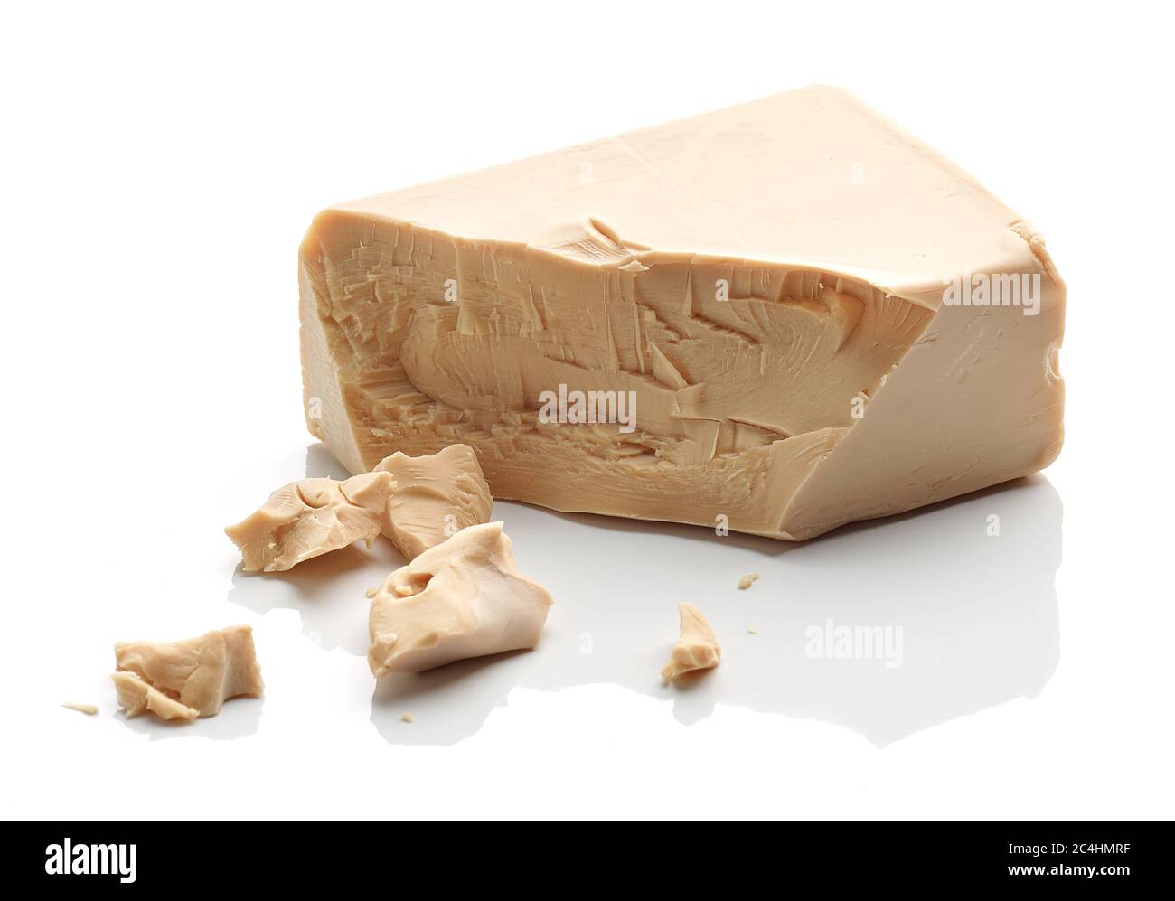 block of yeast isolated on white background Stock Photo Alamy