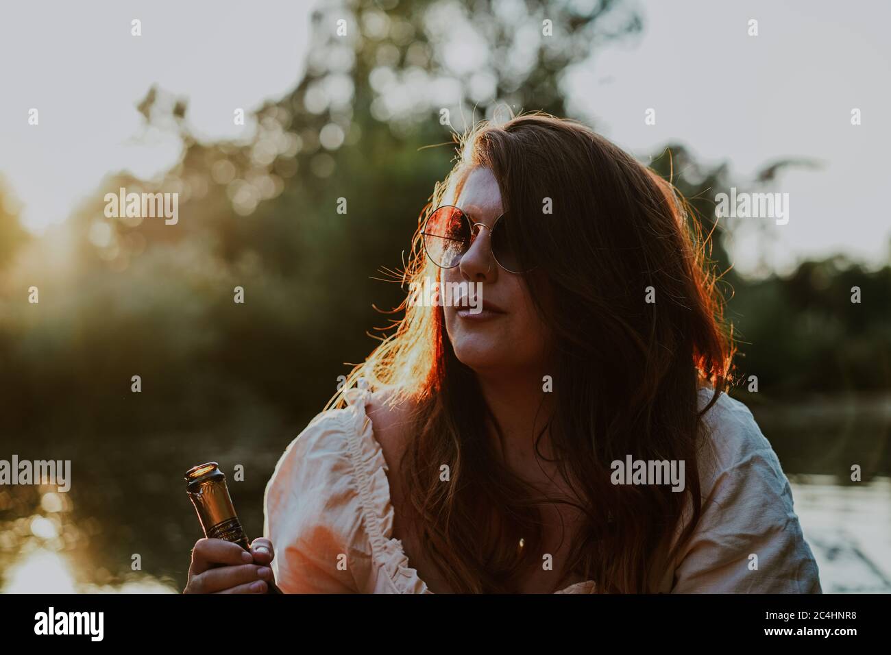 Young attractive woman punting in Oxford, UK Stock Photo