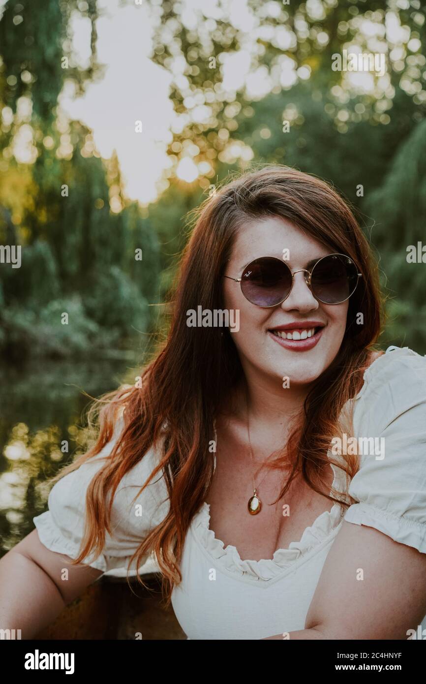 Young attractive woman punting in Oxford, UK Stock Photo