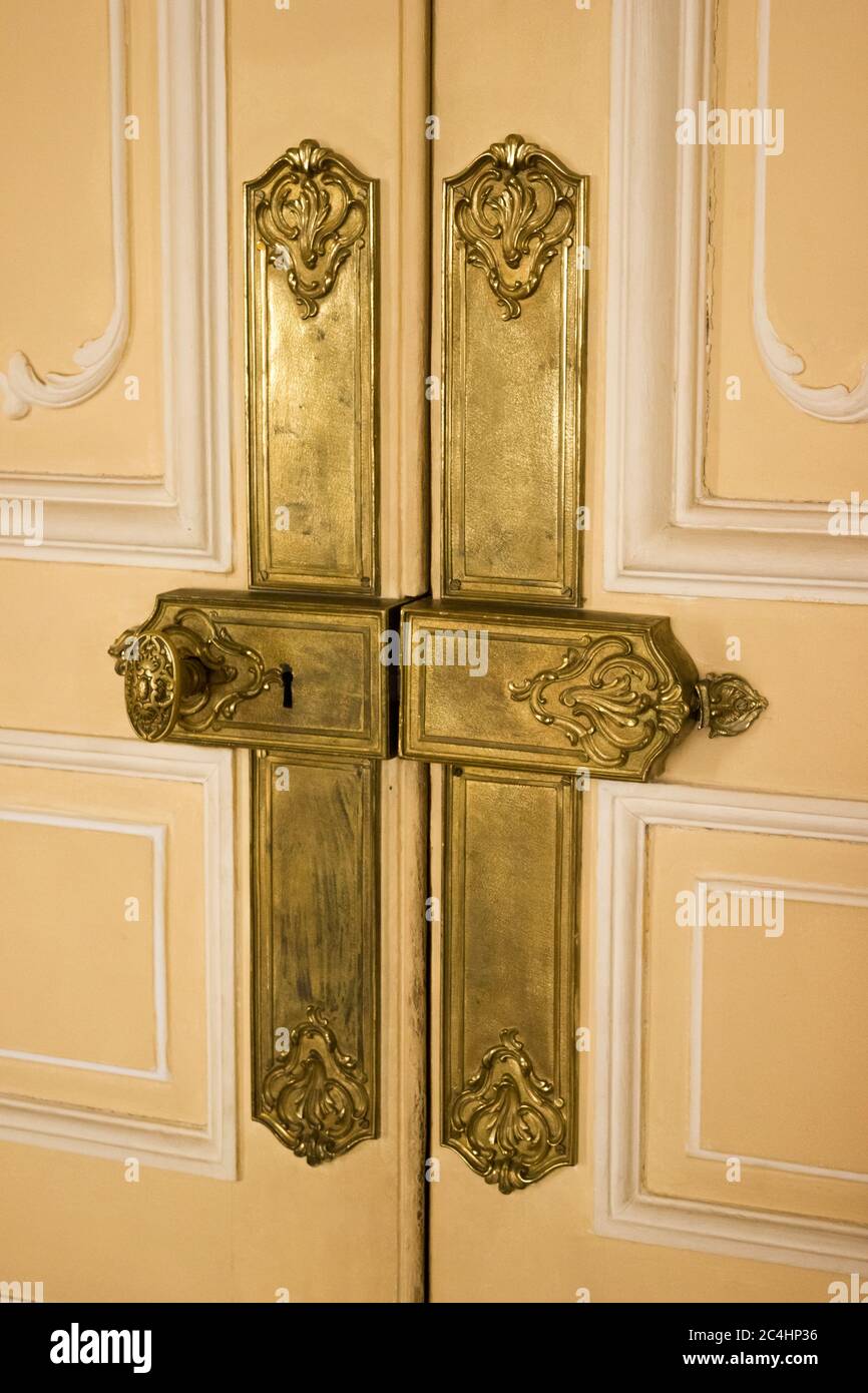 Vintage door lock with handle - in gilding, museum Stock Photo - Alamy