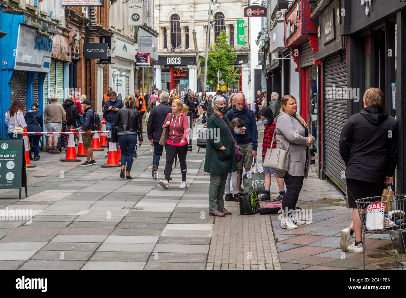 Cork, Ireland. 27th June, 2020. Cork City was busy with shoppers today, as things get back to a new normal after the Coronavirus lockdown. Credit: AG News/Alamy Live News Stock Photo