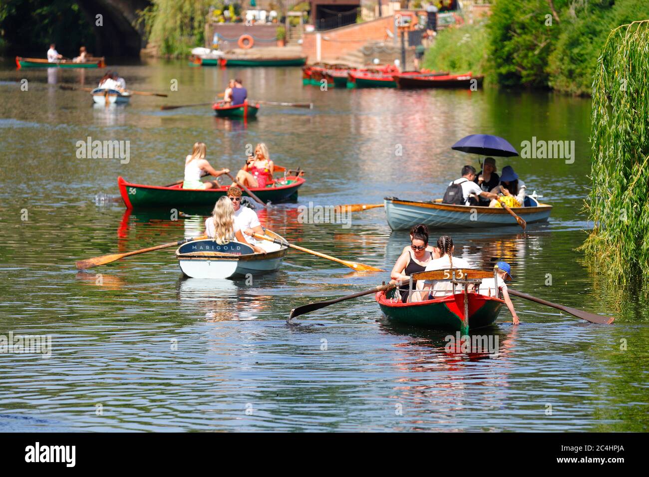 Tourists on rowing boats in the River Nidd at Knaresborough Stock Photo