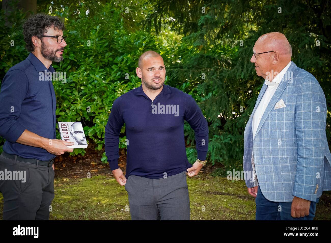 DOORN, Wesley Sneijder (M) presents his book Wesley, a biography written by Kees Jansma (R), Mark van Bommel (L) presents the book, 27-06-2020, Oranjerie Doorn Credit: Pro Shots/Alamy Live News Stock Photo