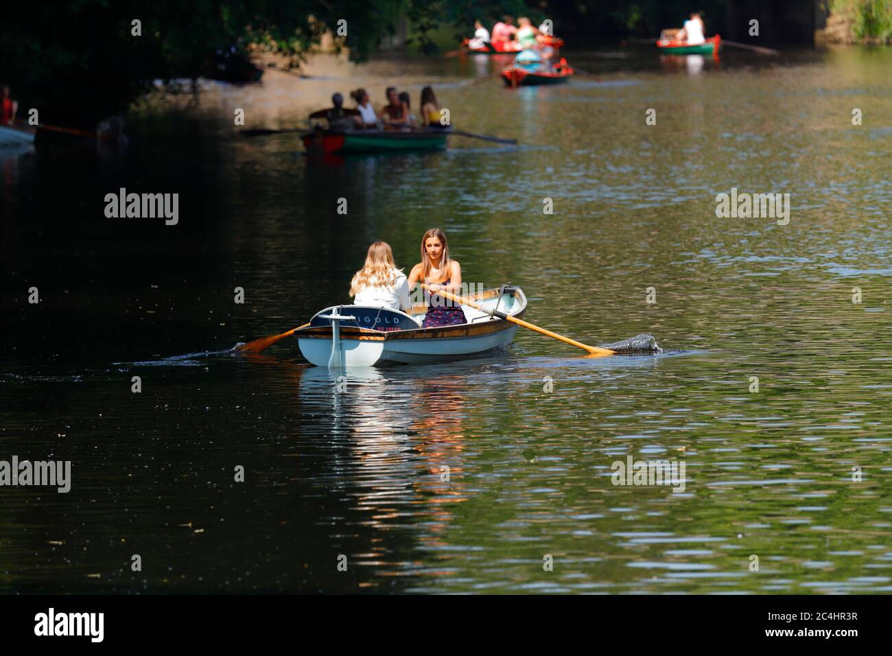 Tourists on rowing boats in the River Nidd at Knaresborough Stock Photo