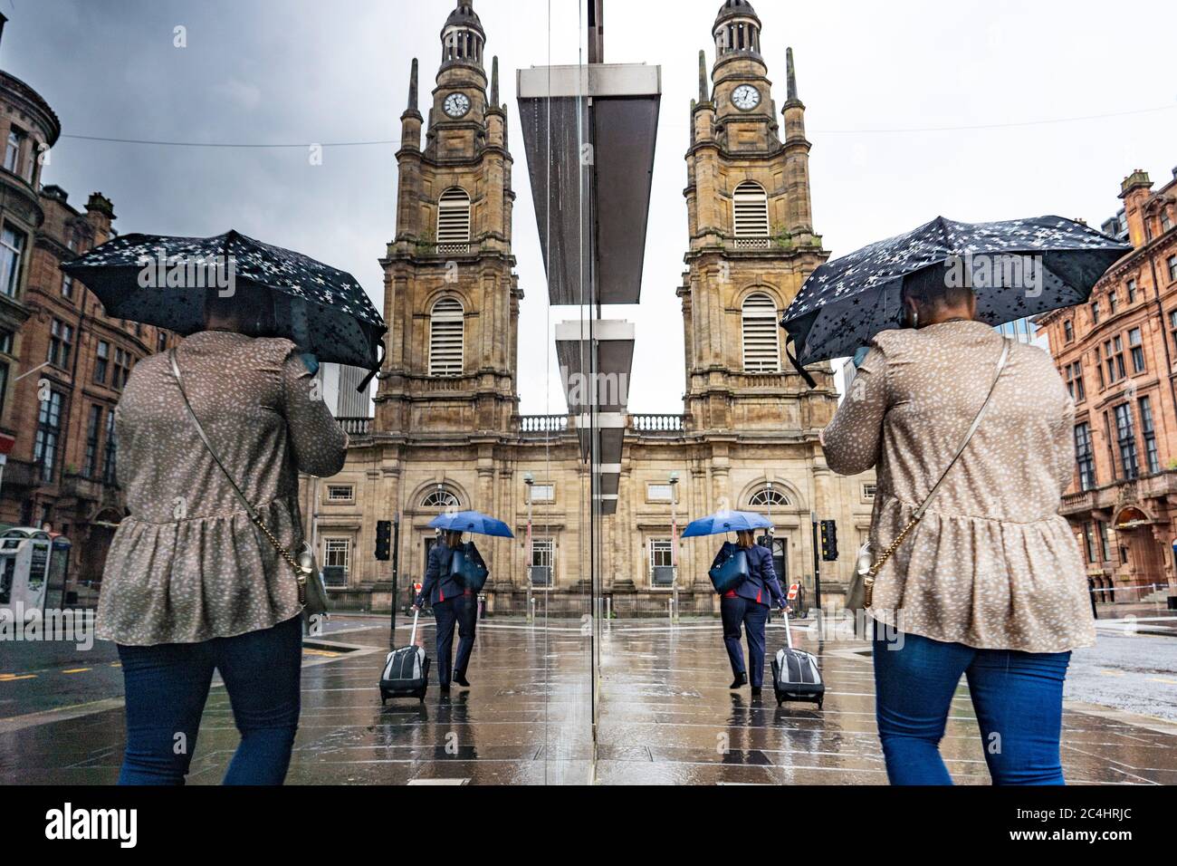Glasgow, Scotland, UK. 27 June, 2020. Heavy rain in Glasgow city centre
