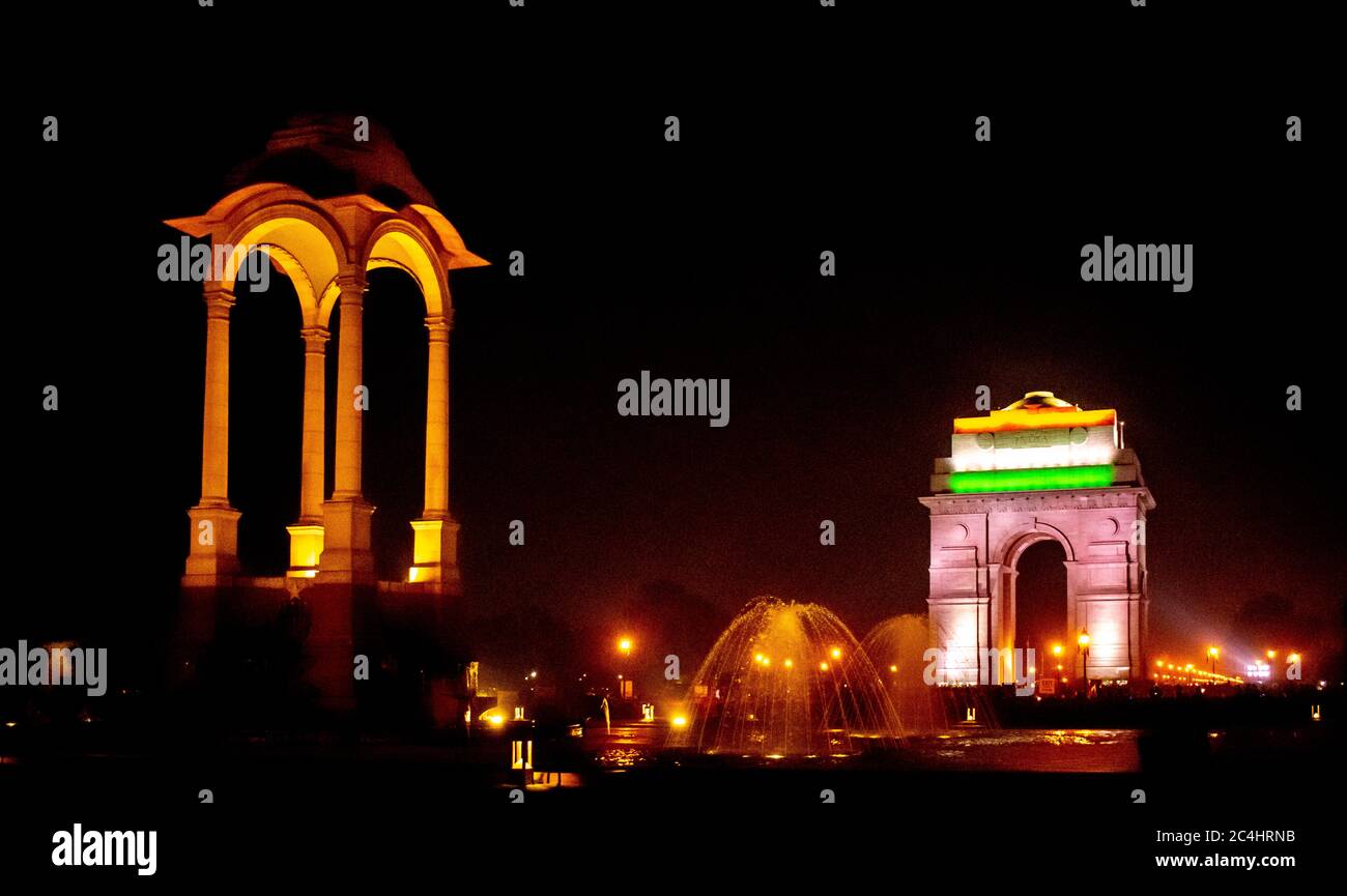 The India Gate with the tri-coloured lightings; an after the sunset/ evening view; India Gate, New Delhi, India Stock Photo