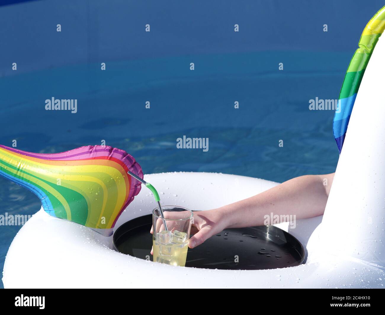 Swimming pool inflatable and drinks tray Stock Photo