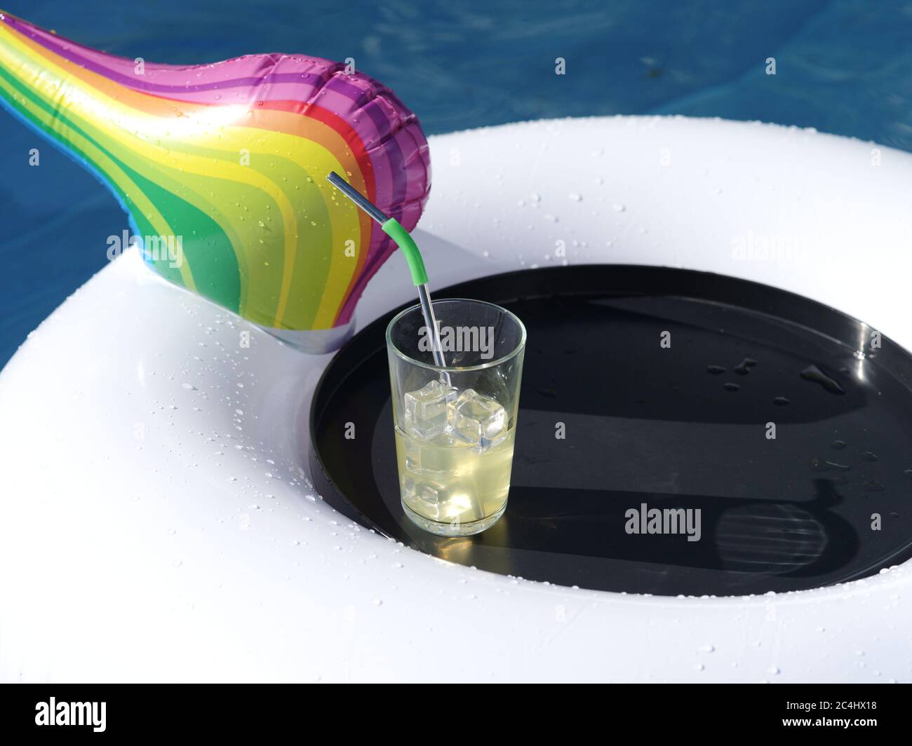 Swimming pool inflatable and drinks tray Stock Photo