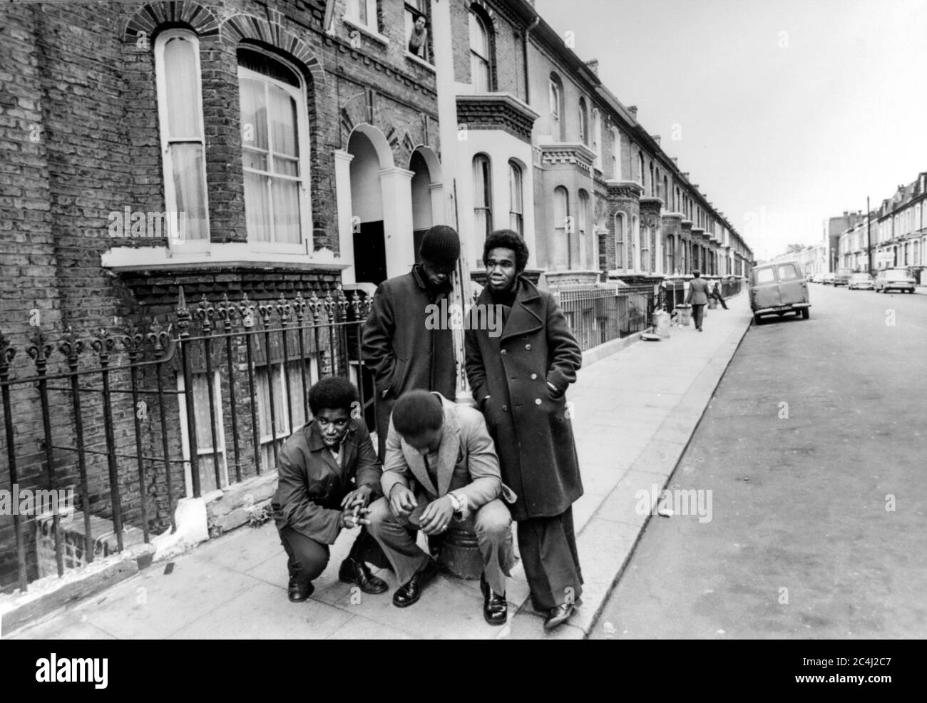 A group of young black men on a street in Brixton, London, in the early 1970s Stock Photo