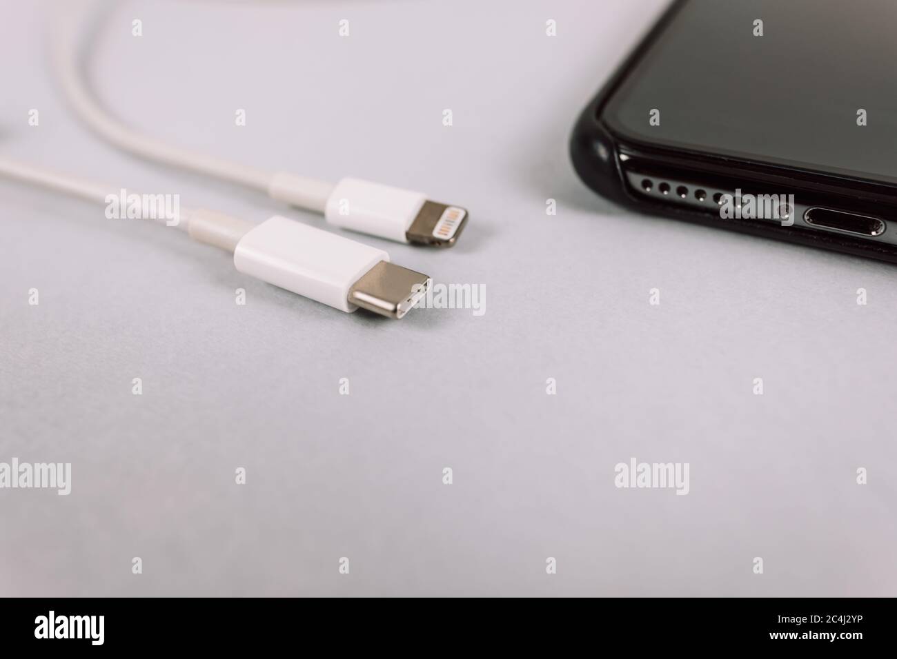 Wires with lightning and typec connectors Stock Photo Alamy