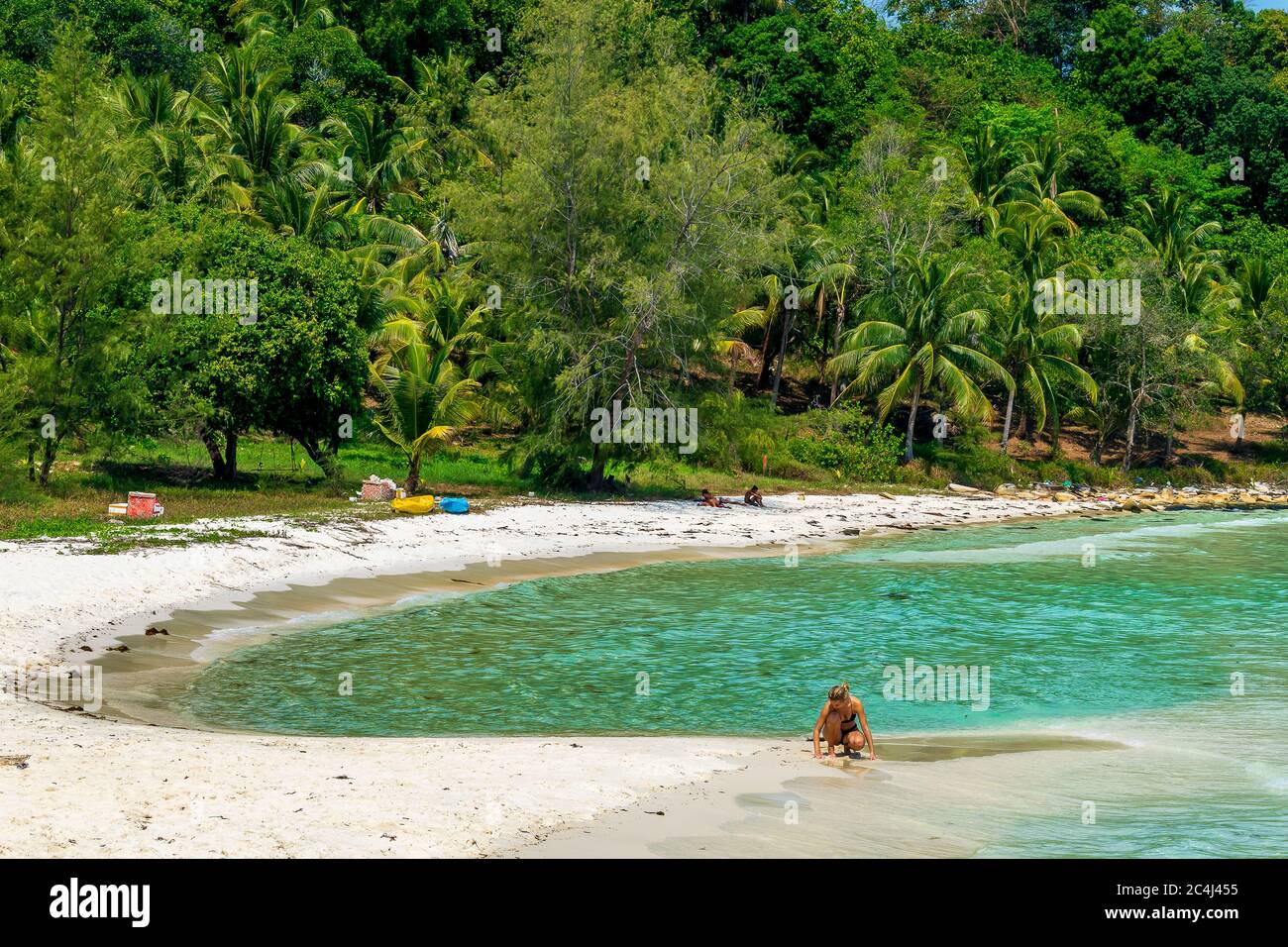 Coconut Beach, Koh Rong, Cambodia Feb, 2020 a woman writting on sand