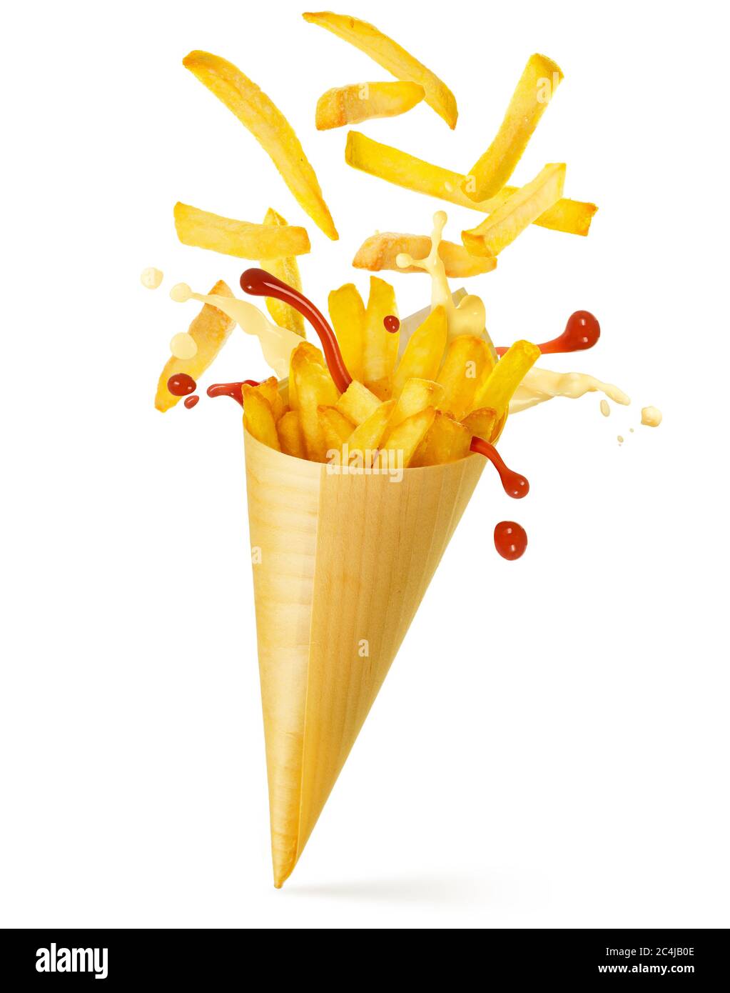 french fries, mayo and ketchup spilling out a paper cone isolated on