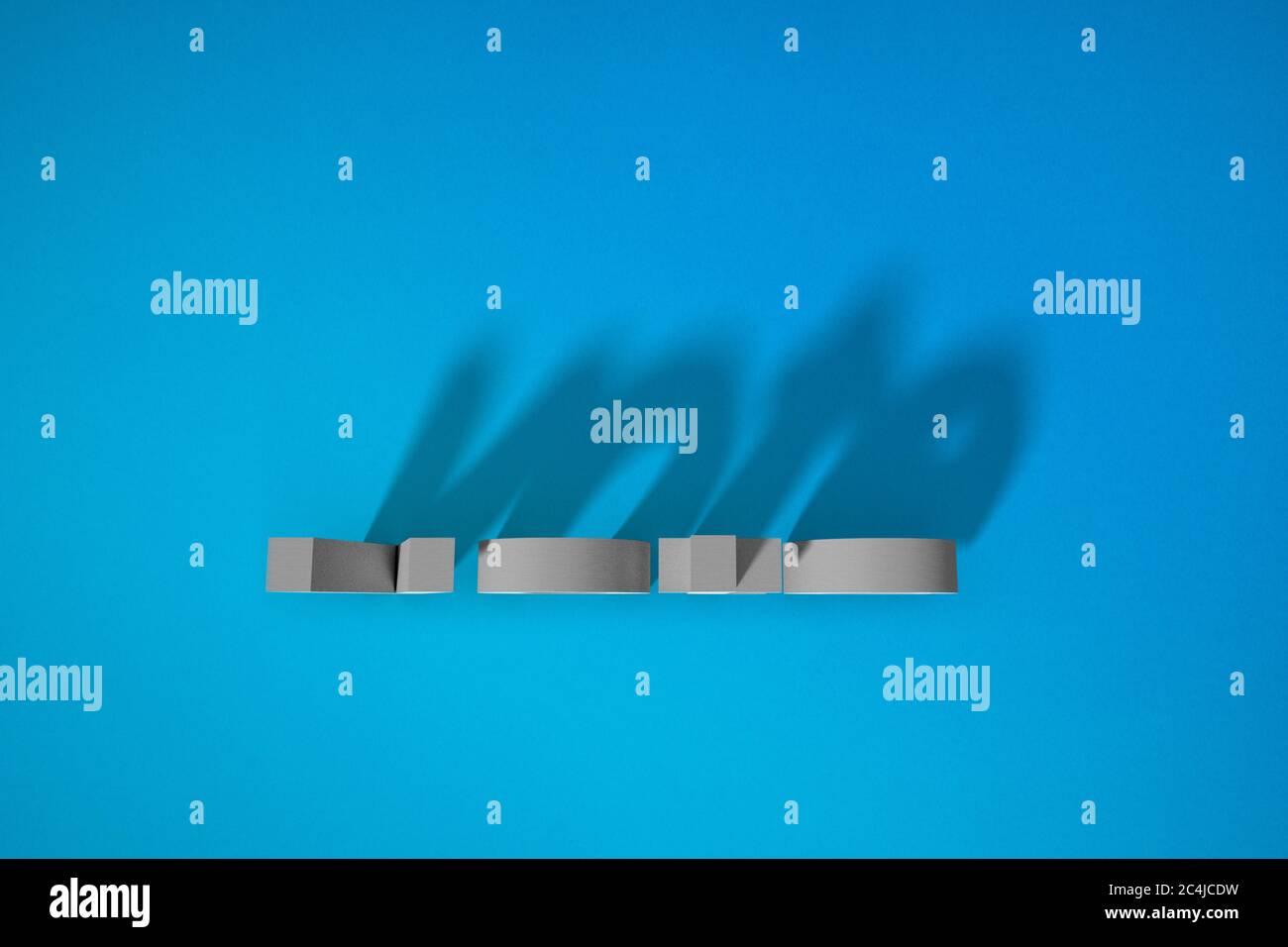Words on a blue background. VOTE blocks and shadows. Stock Photo