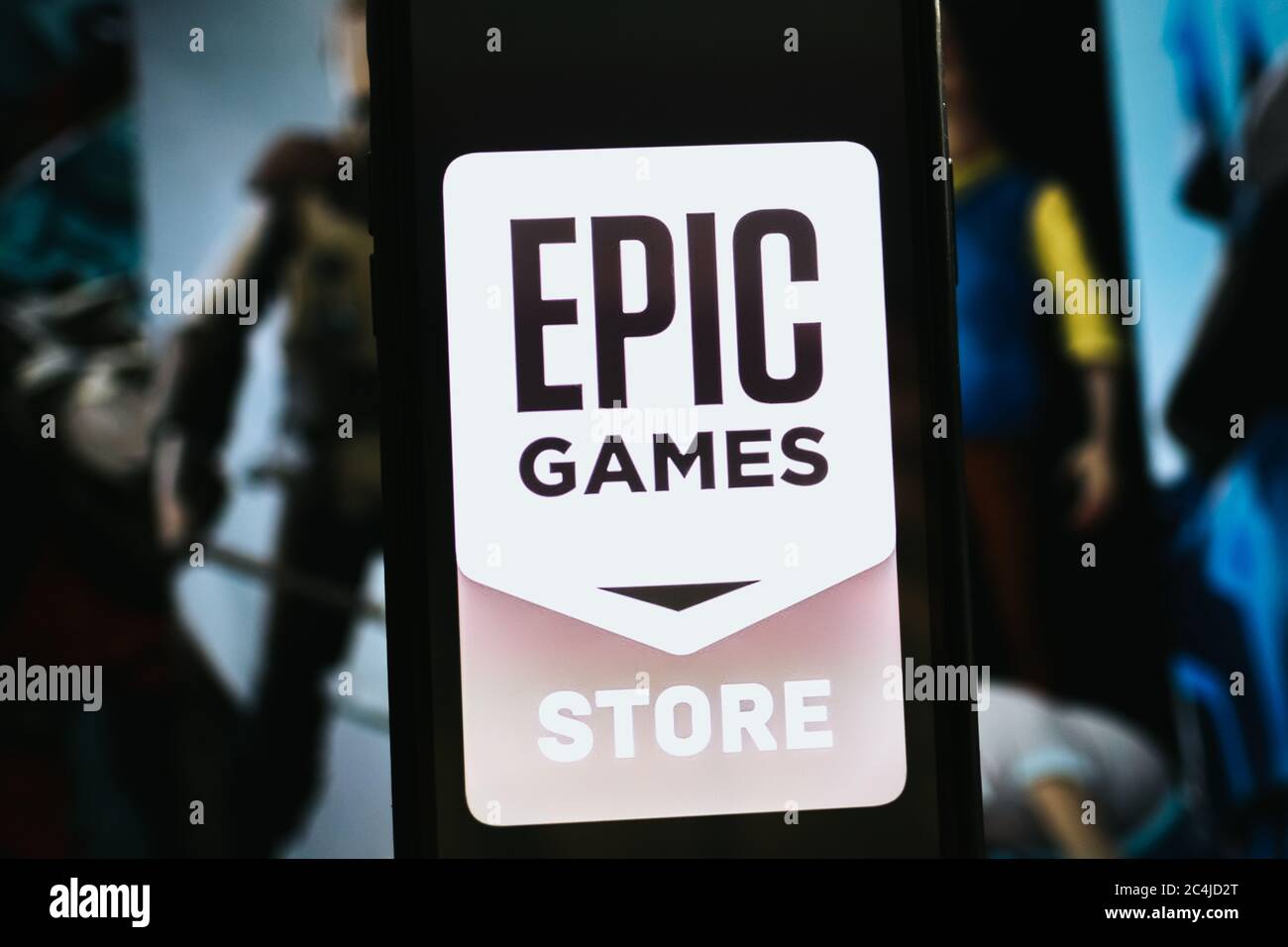 hand holding smartphone with epic games store logo on the screen
