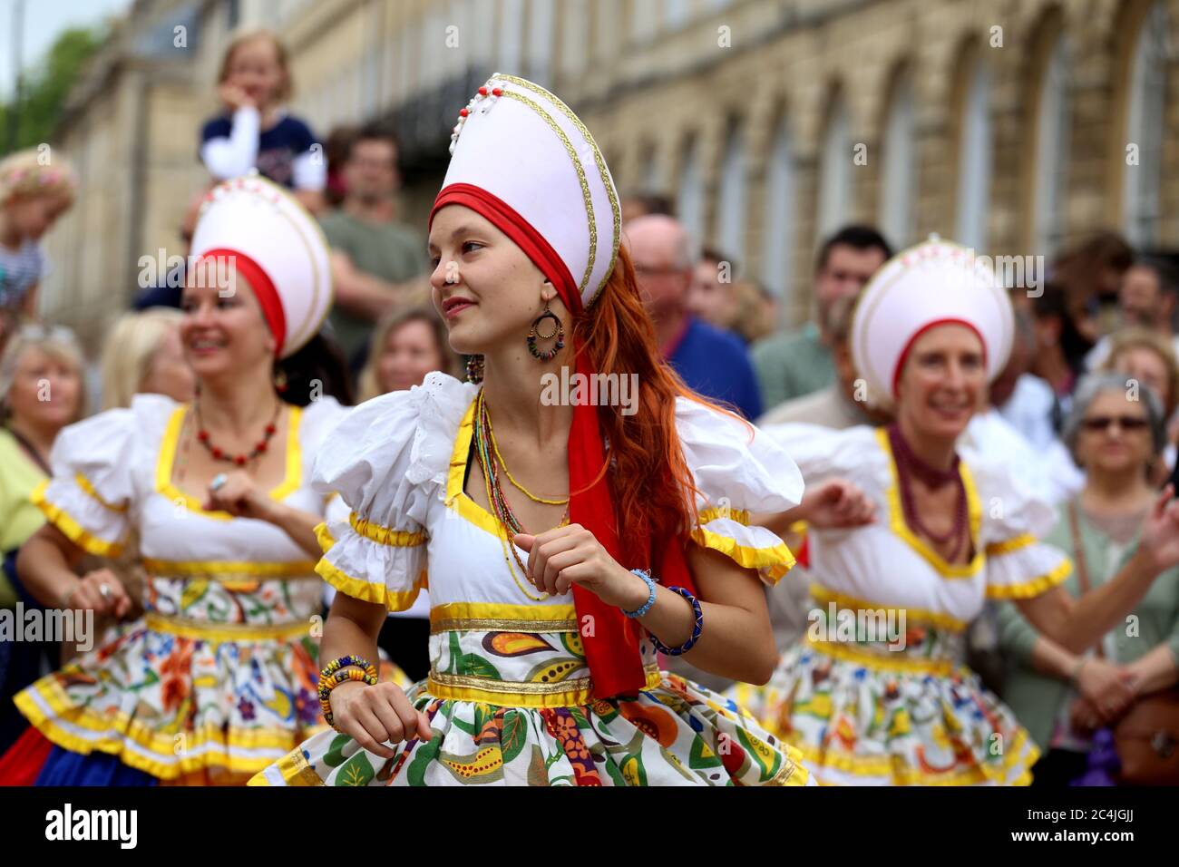 Afon Sistema group dancers perform in traditional dress in Bath Carnival, Somerset, England, United Kingdom.15th of July,2017 Stock Photo