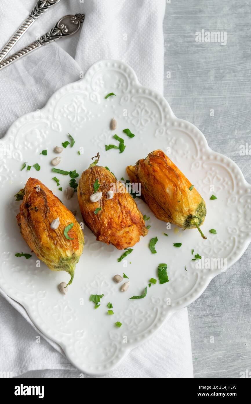 Ready to eat stuffed courgette flowers Stock Photo Alamy