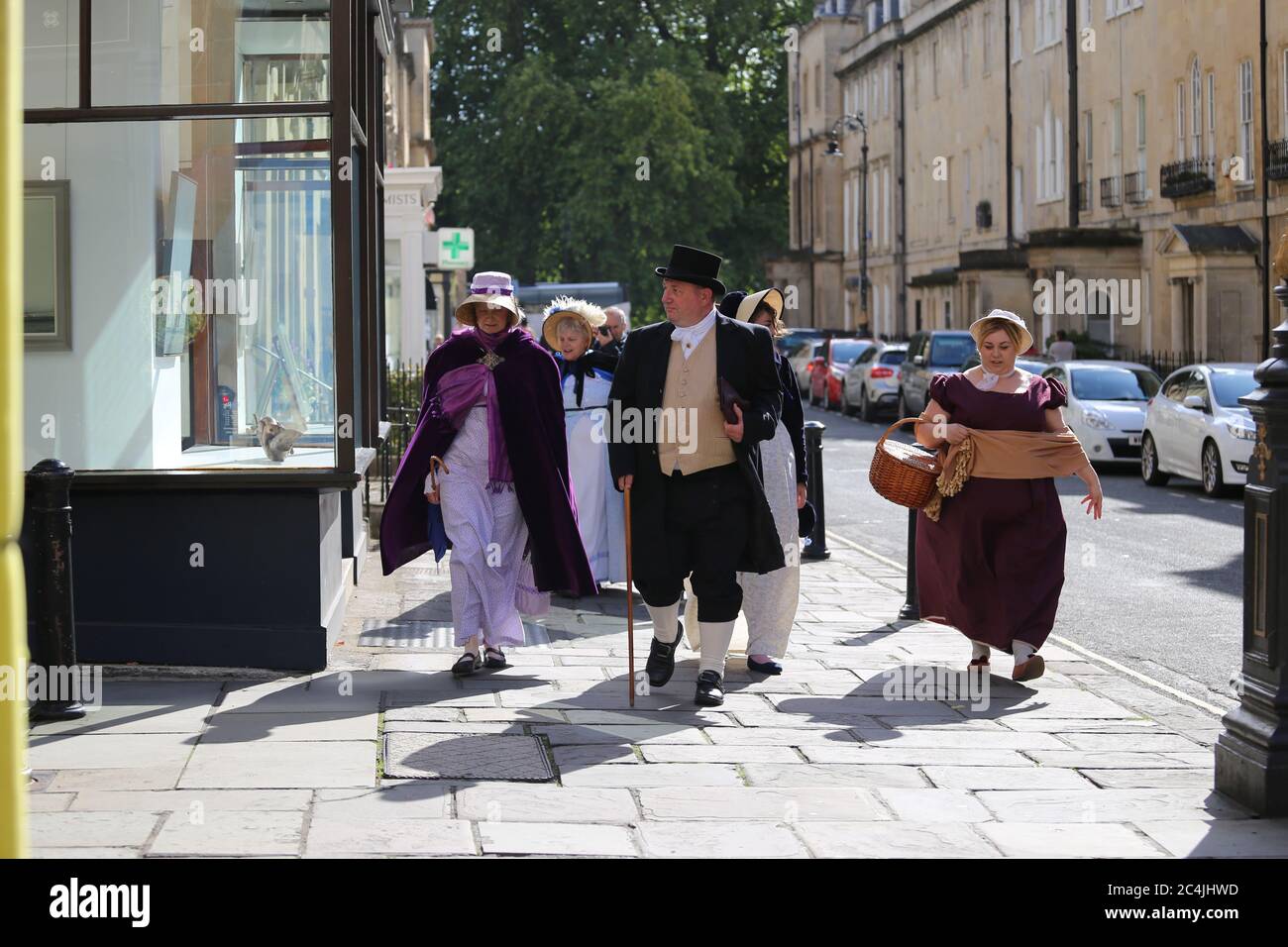 Vintage style dressed people walking at the Regency Costumed Promenade,the 200th anniversary of Jane Austen's death in Bath,England,UK,09/09/2017 Stock Photo