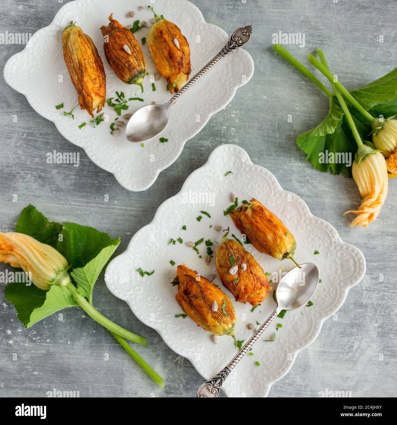 Ready to eat stuffed courgette flowers Stock Photo Alamy
