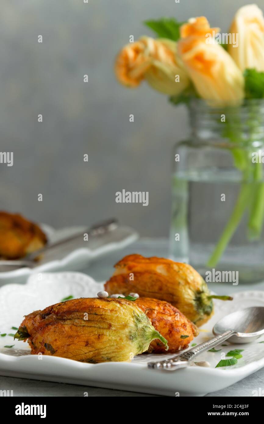Ready to eat stuffed courgette flowers Stock Photo Alamy