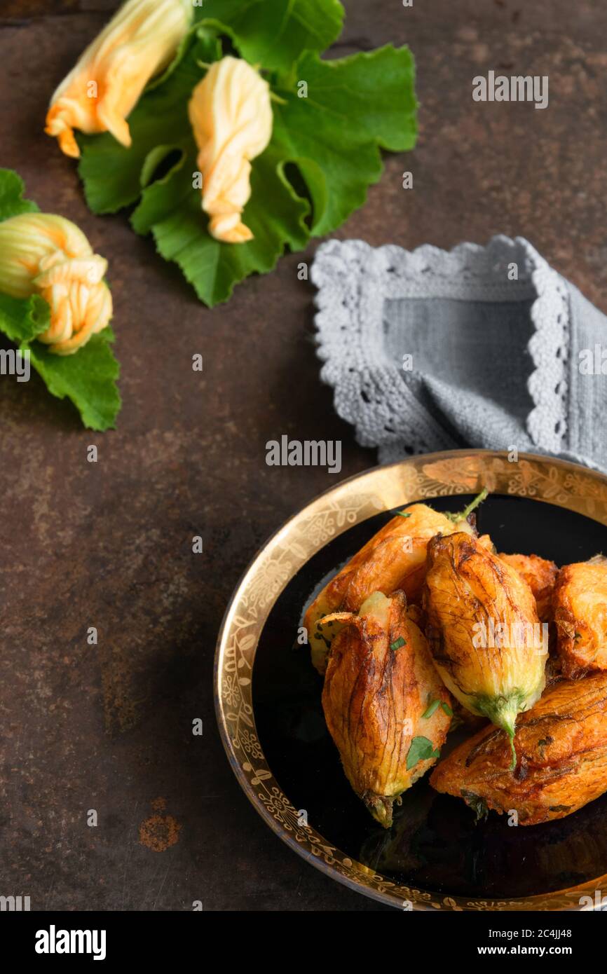 Ready to eat stuffed courgette flowers Stock Photo Alamy