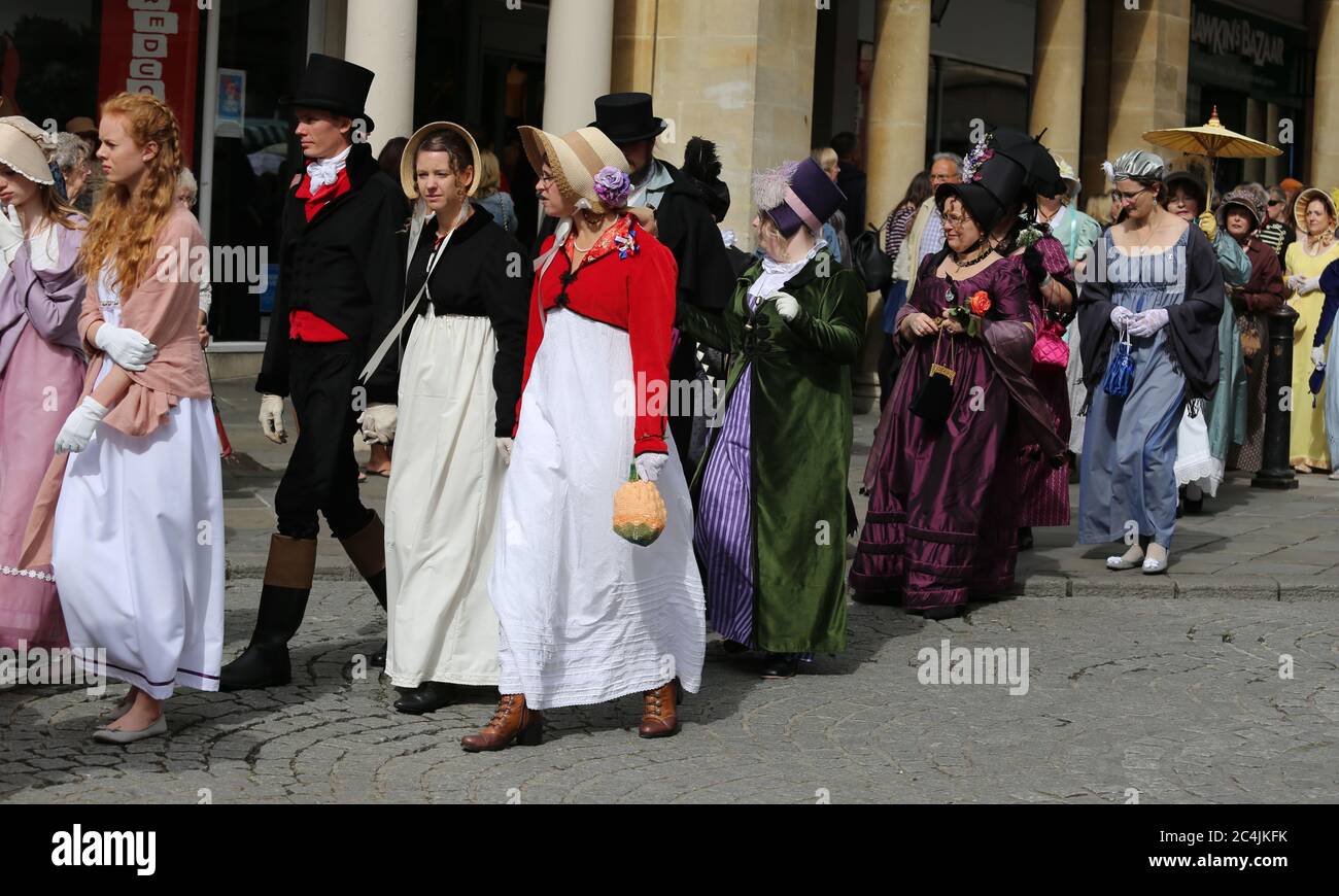 Vintage style dressed people walking at the Regency Costumed Promenade,the 200th anniversary of Jane Austen's death in Bath,England,UK,09/09/2017 Stock Photo