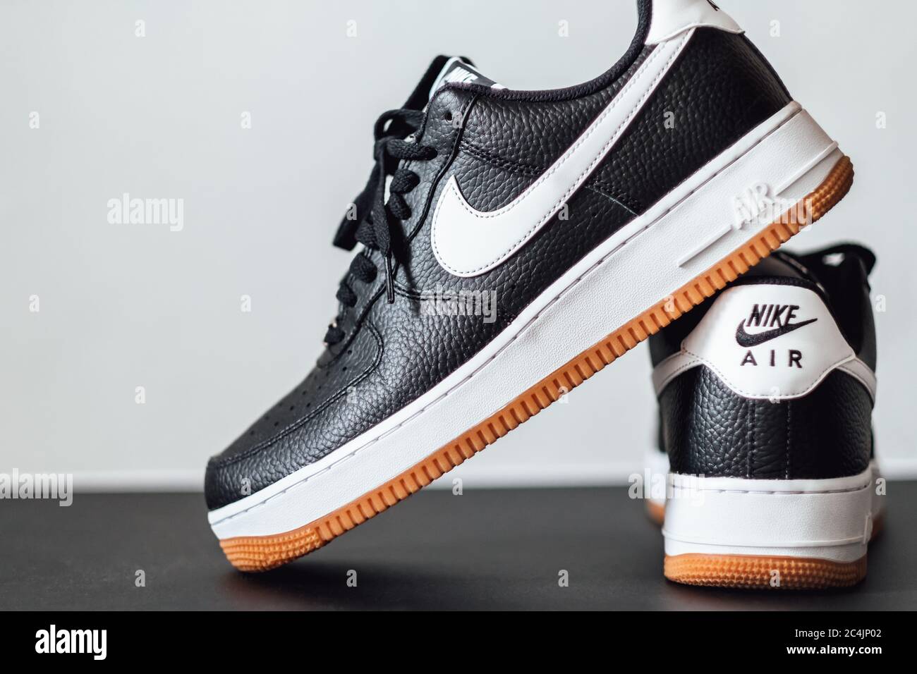 Person in black pants and white nike air force 1 high photo – Free