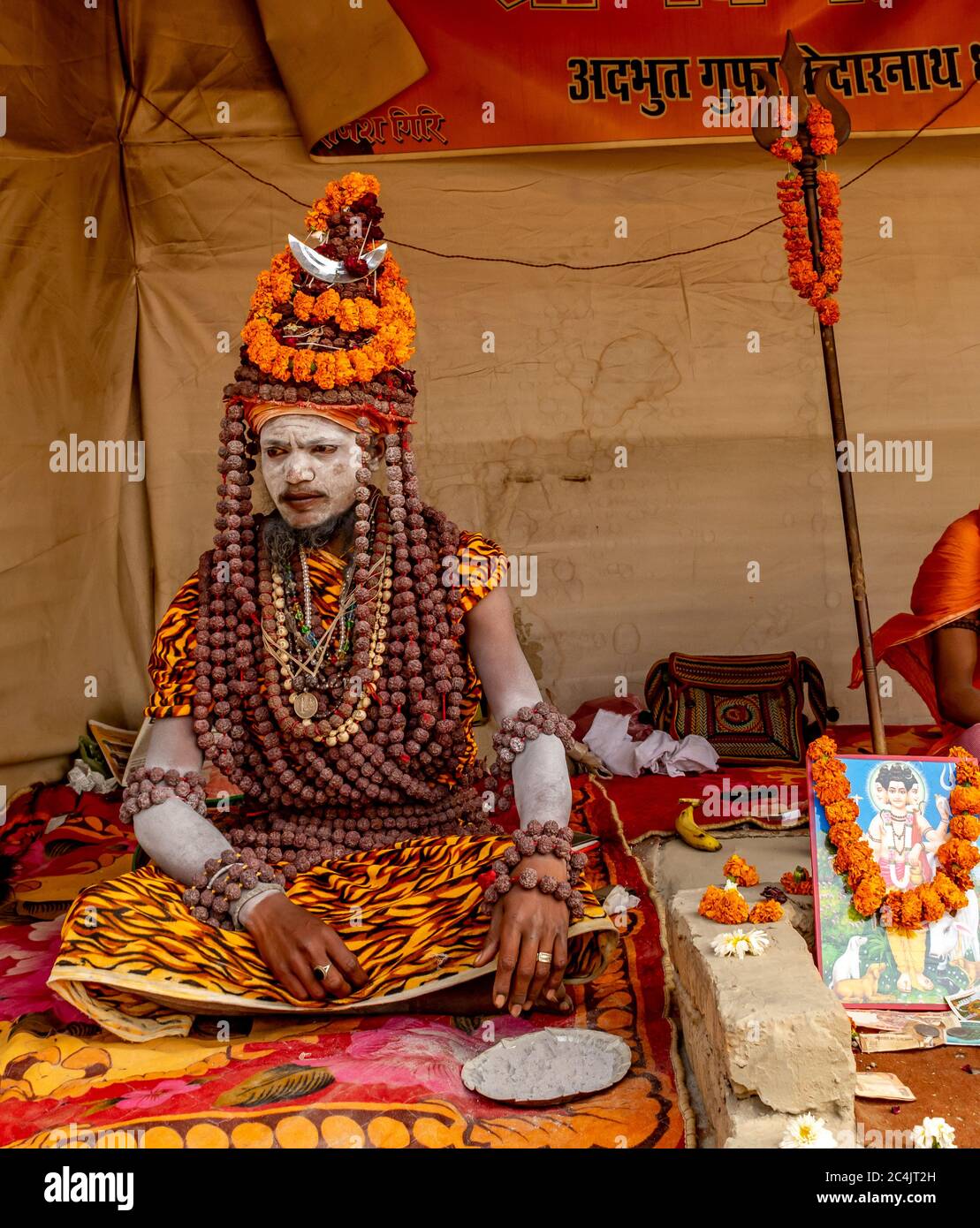 Kumbha Mela, Allahabad, Uttar Pradesh, India; 17-Feb-2019; sadhus/ Hindu holy men/ saint giving blessings Stock Photo