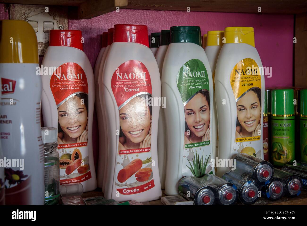 Naomi ultra lightening lotion on sale in a cosmetics shop in Gulu.It is available in carrot, aloe vera, papaya or lemon flavour, and comes from India. It is thought roughly 40 percent of African women bleach their skin. Stock Photo