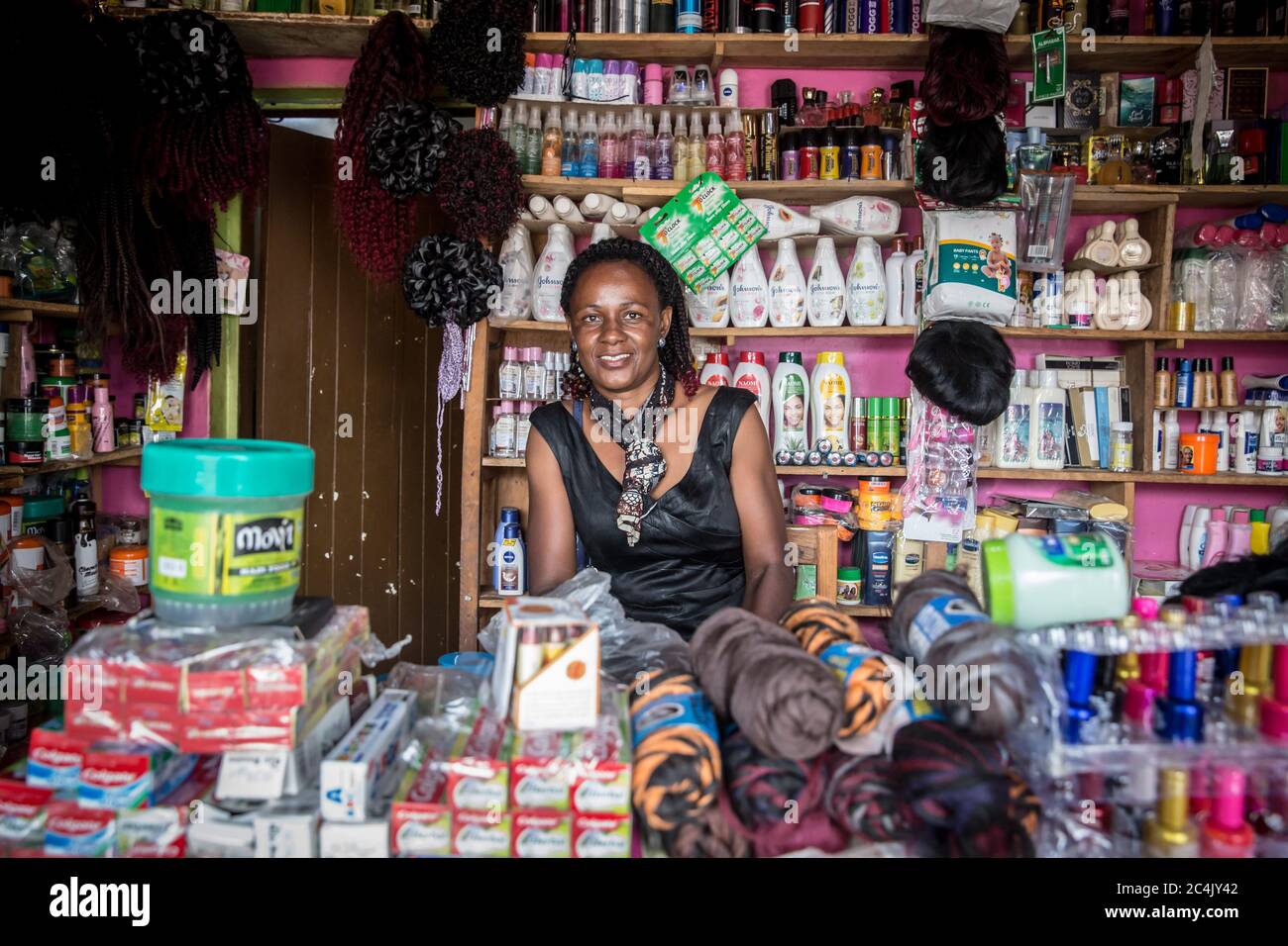 Constance Akamo, who owns a cosmetics shop in Gulu, northern Uganda, sells skin lightening creams. She says 'most people want to bleach.' It is thought as many as 40 percent of African women bleach their skin. Stock Photo