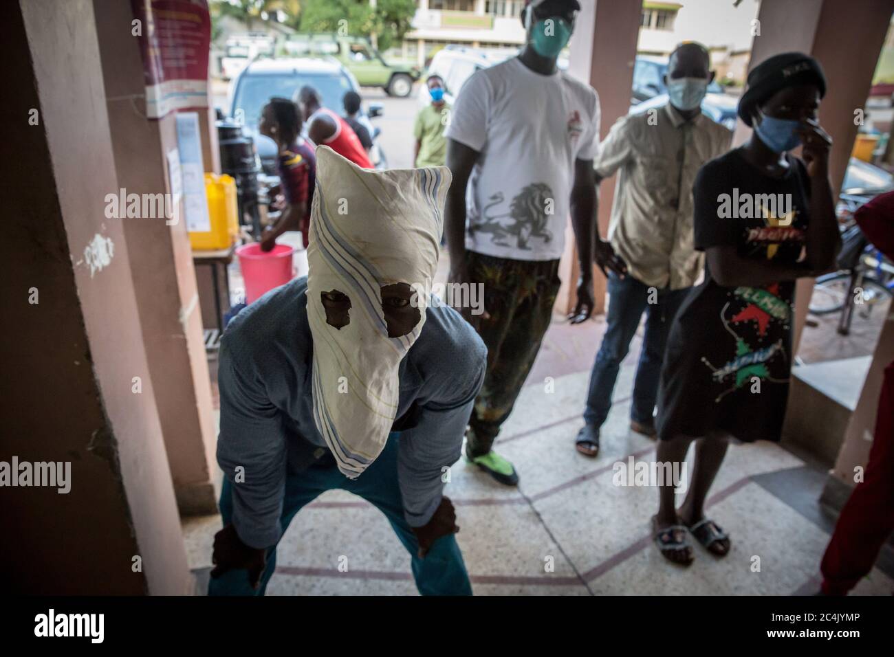 Gulu Northern Region Uganda 29th May 2020 A Man Wearing An Unusual Mask Poses Outside A