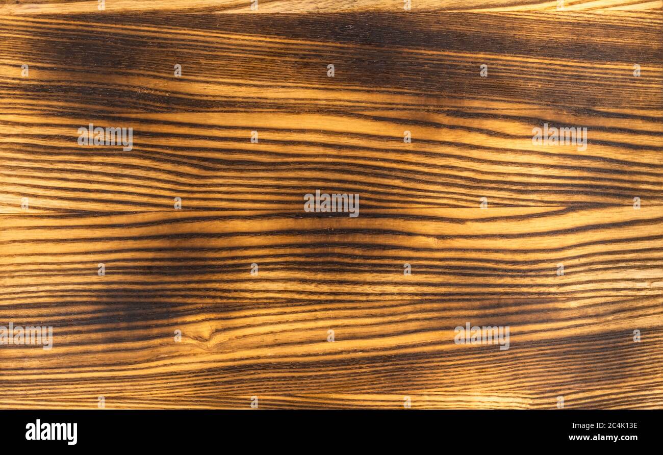 Raw burnt wood texture background. Stock Photo