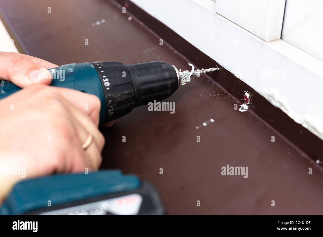 Construction work drilling holes Stock Photo Alamy