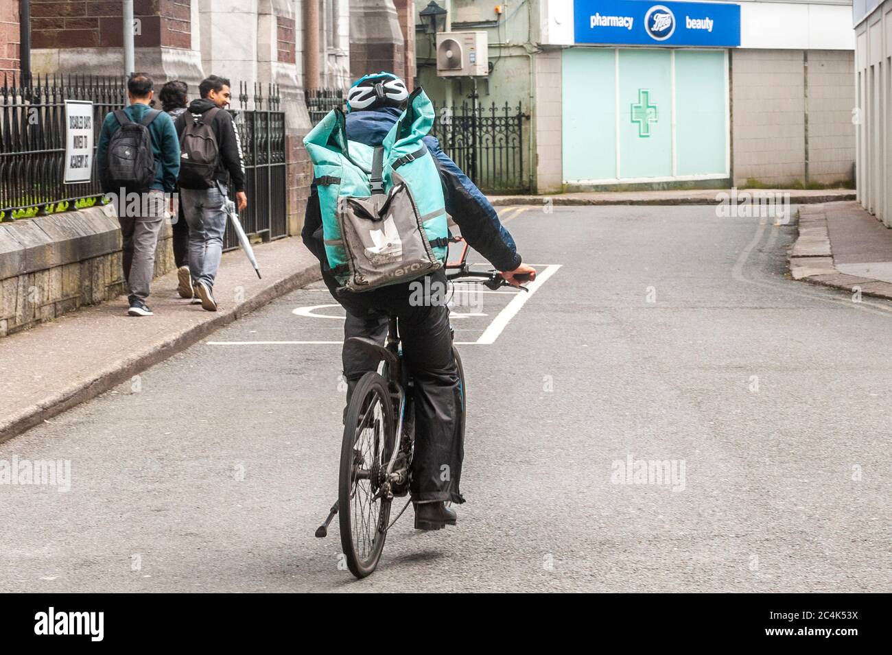 Deliveroo Food Delivery Rider in Cork City, Ireland Stock Photo Alamy