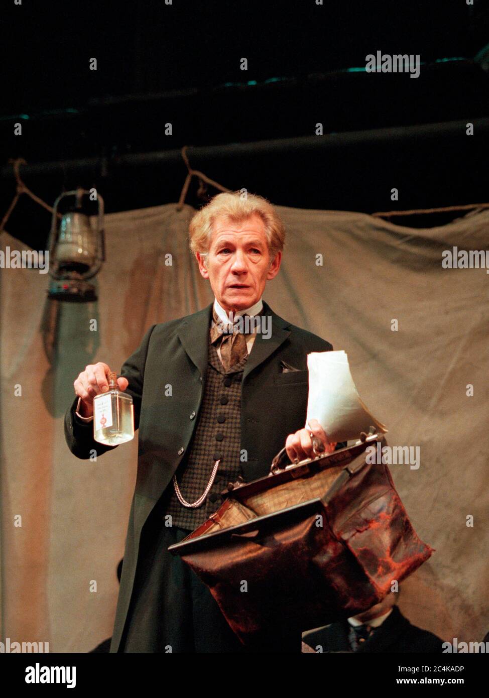 Ian McKellen (Dr. Tomas Stockmann) in AN ENEMY OF THE PEOPLE by Henrik Ibsen at the Olivier Theatre, National Theatre (NT), London SE1 19/09/1997  in a version by Christopher Hampton set design: John Napier costumes: John Bright lighting: David Hersey director: Trevor Nunn Stock Photo