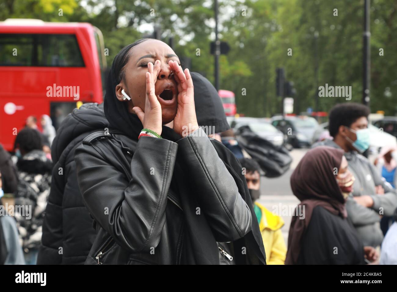 Central London, UK, 27th June, 2020:; Thousands of youg people marched from Hyde Park to Parliament Square and central London, Shukri Yahye-Abdi drowned in the river Irwell and police are still looking into her cause of death, petitions have been sent to Mayor of Manchester Andy Burnham with over 6000 signatures to look into what many believe to be a racist attack: Credit Natasha Quarmby/ALAMY Live News Stock Photo