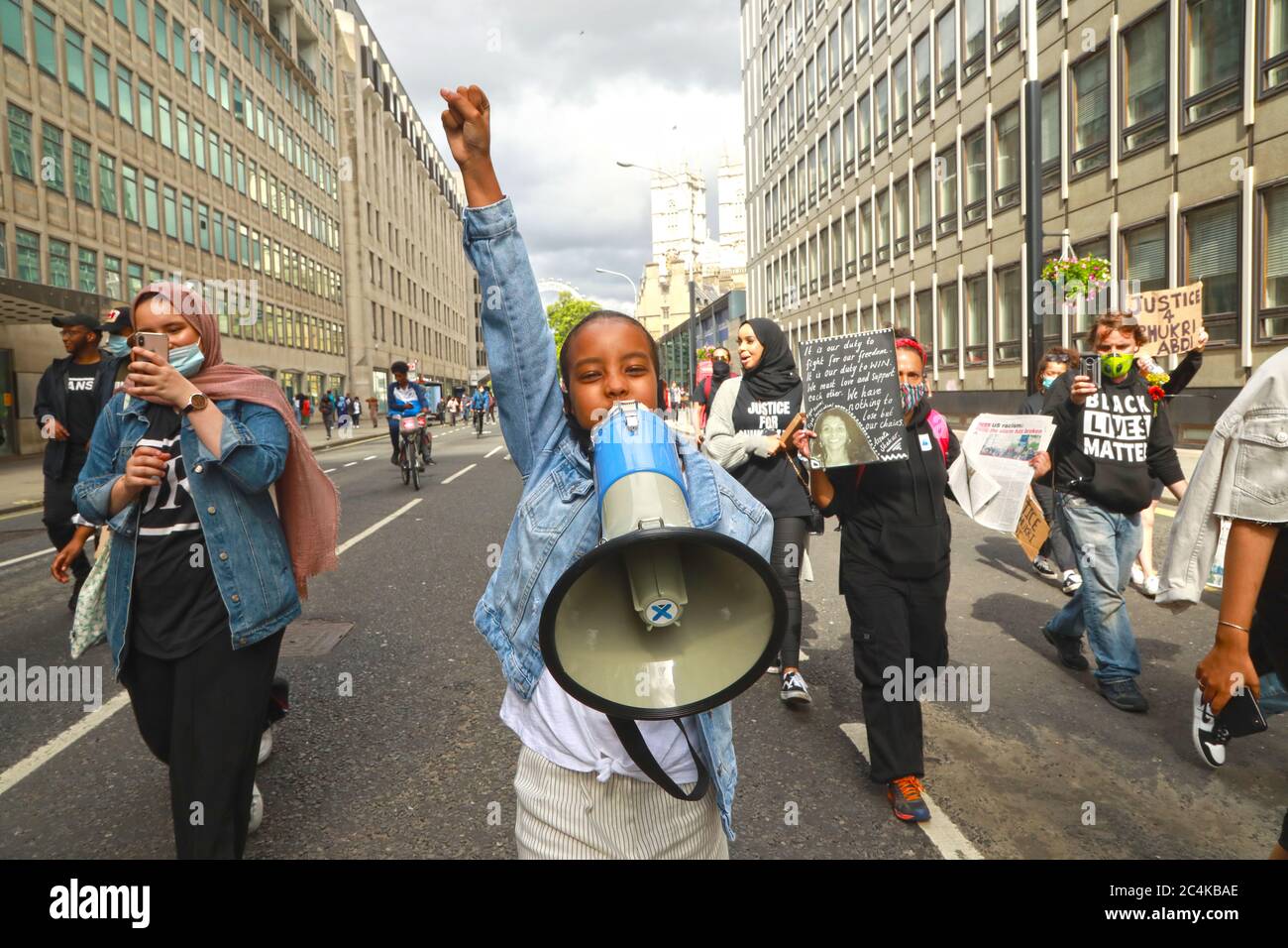 Central London, UK, 27th June, 2020:; Thousands of youg people marched from Hyde Park to Parliament Square and central London, Shukri Yahye-Abdi drowned in the river Irwell and police are still looking into her cause of death, petitions have been sent to Mayor of Manchester Andy Burnham with over 6000 signatures to look into what many believe to be a racist attack: Credit Natasha Quarmby/ALAMY Live News Stock Photo