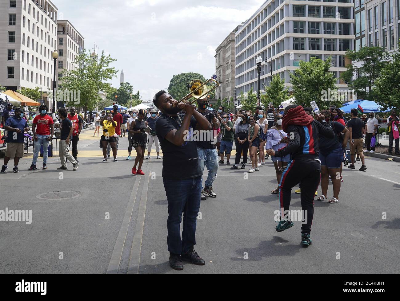 Washington, United States. 27th June, 2020. The Experience Band and Show perform during The Chocolate City Experience & Black Lives Matter DC Collab at Black Lives Matter Plaza on Saturday, June 27, 2020 in Washington, DC. Protests, demonstrations, and gatherings have taken place daily since the death of George Floyd in Minneapolis, MN. Photo by Leigh Vogel/UPI Credit: UPI/Alamy Live News Stock Photo