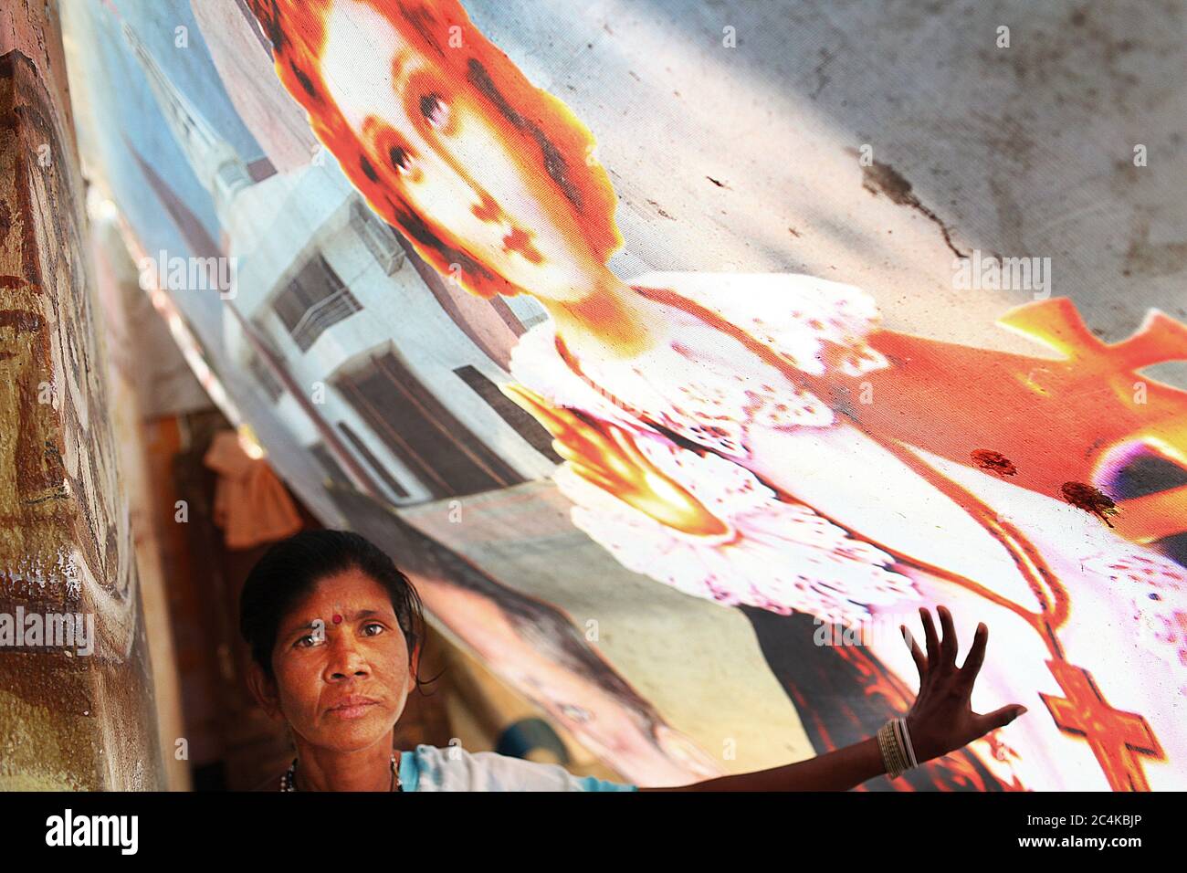 Anthonyamma (56) works as a canteen cleaner from 6 am to midnight. She has lived in Ejipura for