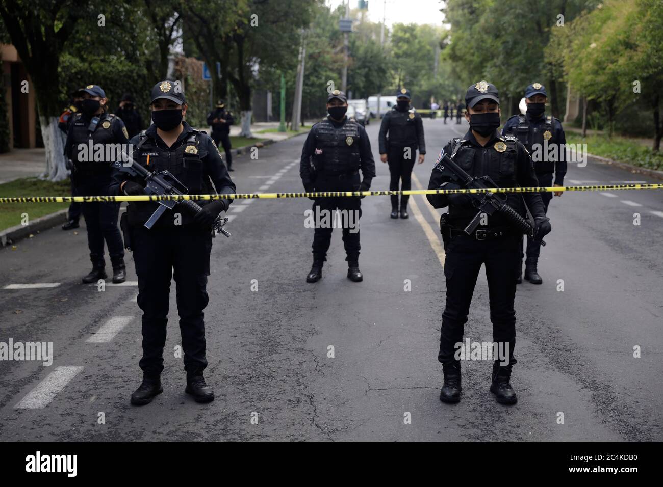 MEXICO CITY, MEXICO - JUNE 26, 2020:  A officers guard crime zone where the secretary of Citizen Security of Mexico City, Omar Garcia Harfuch was the victim of an attack on Reforma Avenue in the Lomas de chapultepec neighborhood. Approximately during 20 minutes At 6:38 in the morning of this friday the shooting was carried out on June 26, 2020 in Mexico City, Mexico (Photo by Eyepix Group/Pacific Press/Sipa USA) Stock Photo