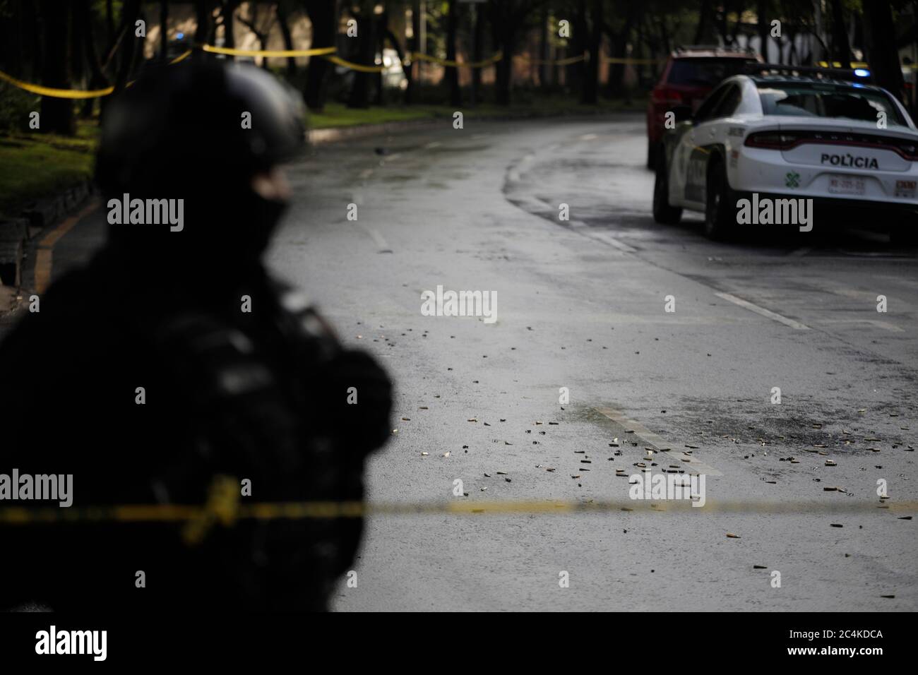 MEXICO CITY, MEXICO - JUNE 26, 2020:  A police car who was hit with bullets seen in  crime zone where the secretary of Citizen Security of Mexico City, Omar Garcia Harfuch was the victim of an attack on Reforma Avenue in the Lomas de chapultepec neighborhood. Approximately during 20 minutes At 6:38 in the morning of this friday the shooting was carried out on June 26, 2020 in Mexico City, Mexico (Photo by Eyepix Group/Pacific Press/Sipa USA) Stock Photo