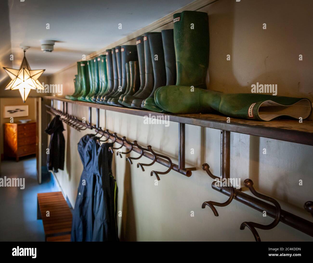 Endsleigh Hotel in West Devon, England. Boots and rain jackets are available for house guests. The garden can thus be explored in any weather. Wrong clothing is no longer considered an excuse Stock Photo