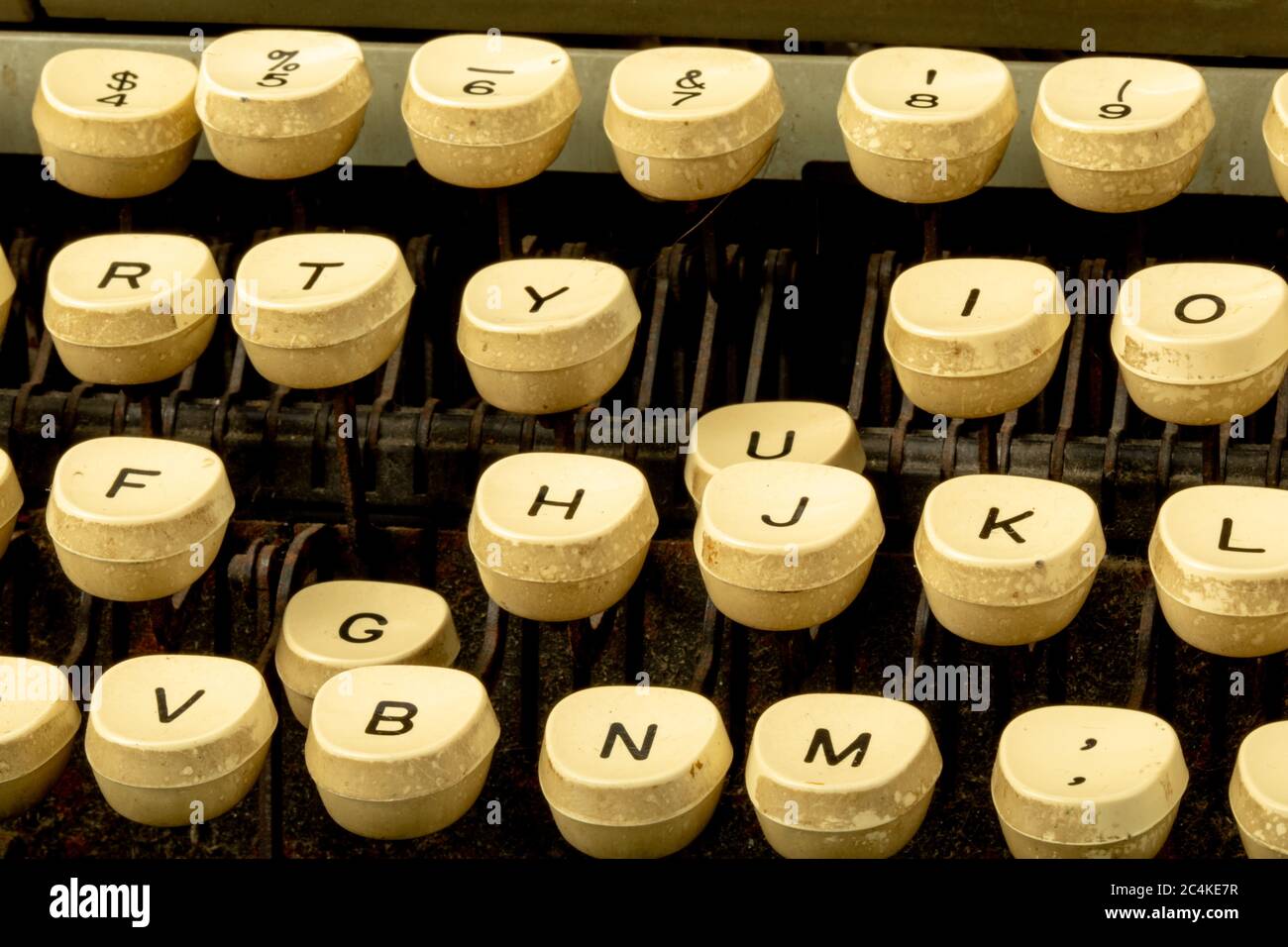 group of stuck keys of an old grungy well used typewriter Stock Photo