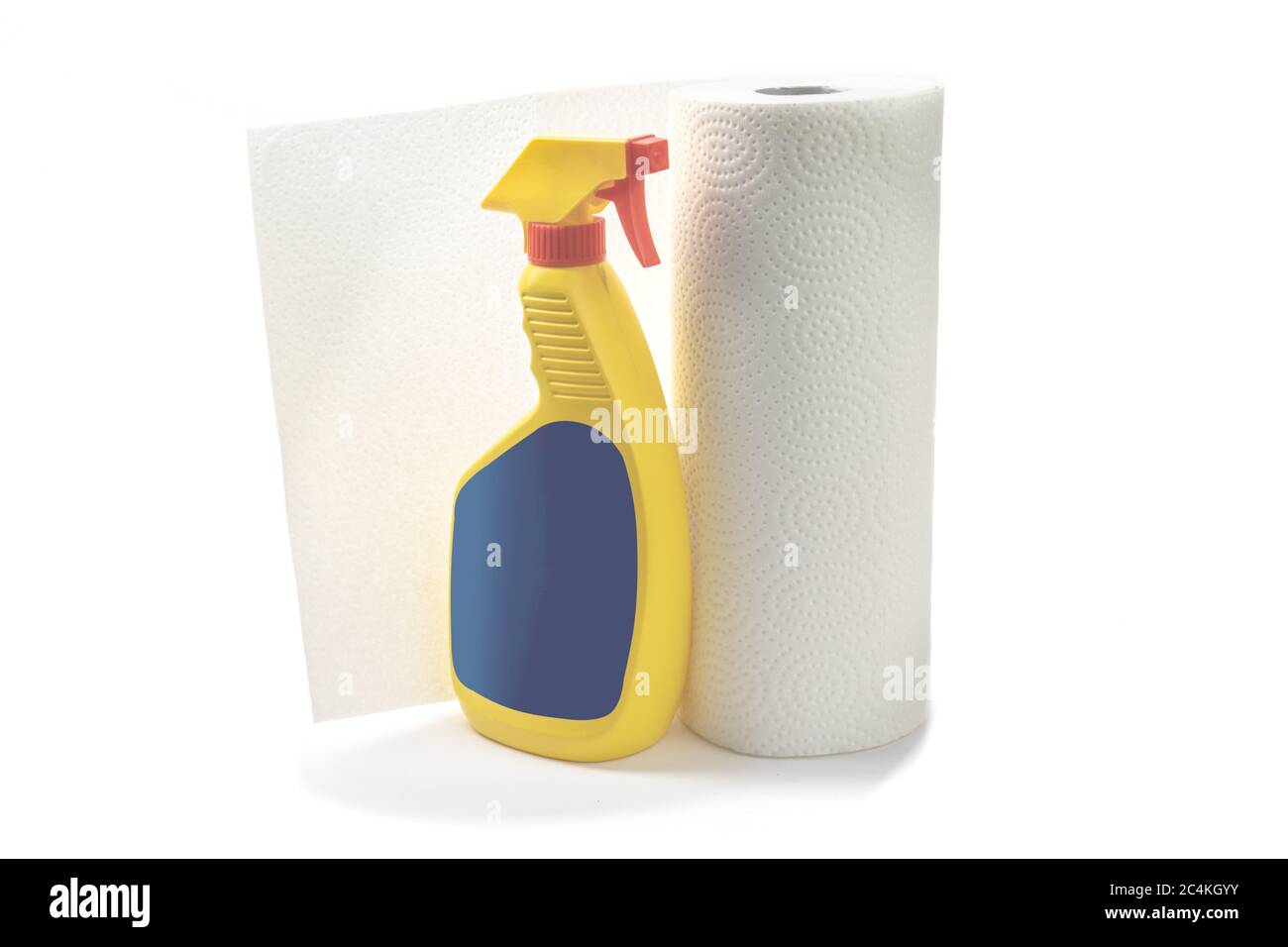 a disinfectant spray bottle and a roll of paper towels isolated on