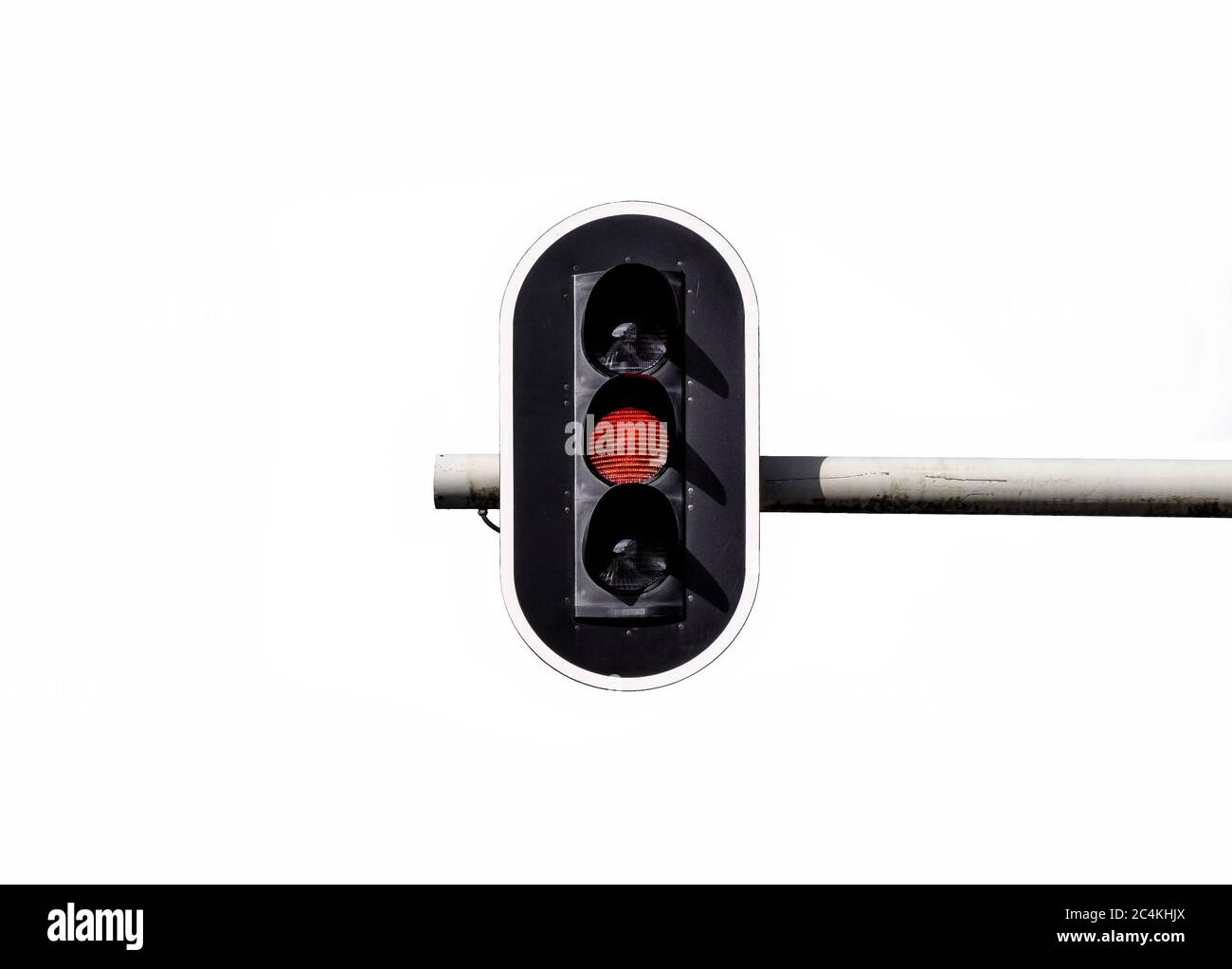 Closeup shot of a traffic light with the orange signal light on in