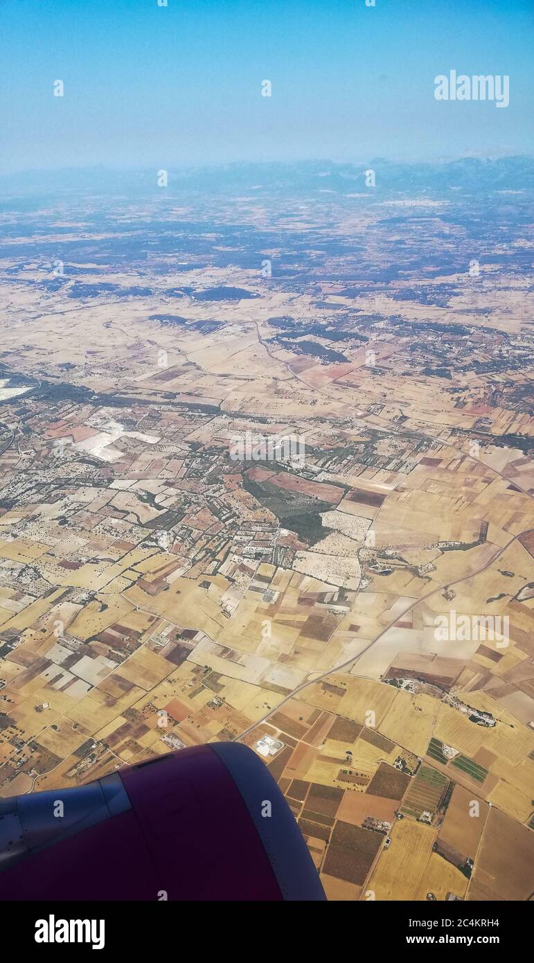 Mallorca, Spain, photographed from an airplane window. Clear view of the Island in sunny weather, during holiday. Stock Photo