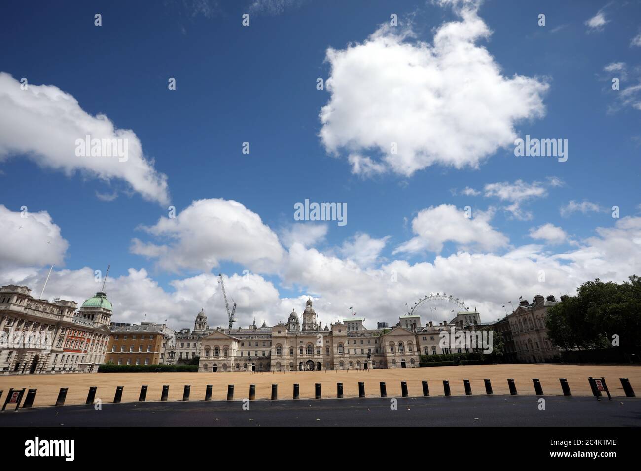 London, UK. 27th June, 2020. Despite it being Armed Forces Day, Horse Guards Parade is completely deserted at lunchtime, as the COVID-19 Coronavirus pandemic has prevented many official events from taking place and also kept many tourists and sightseers away also. Credit: Paul Marriott/Alamy Live News Stock Photo