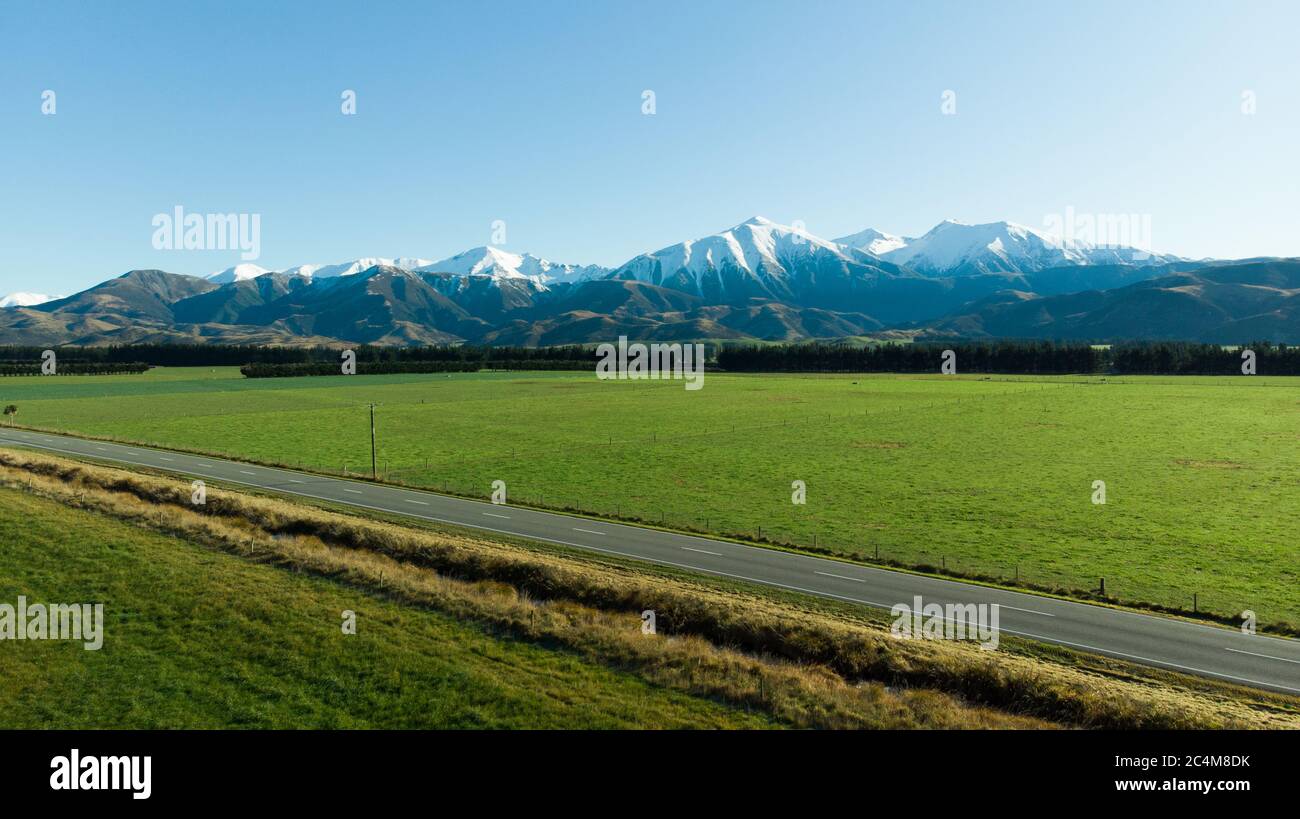 Beautiful highway road with mountain in rural on day time. Stock Photo