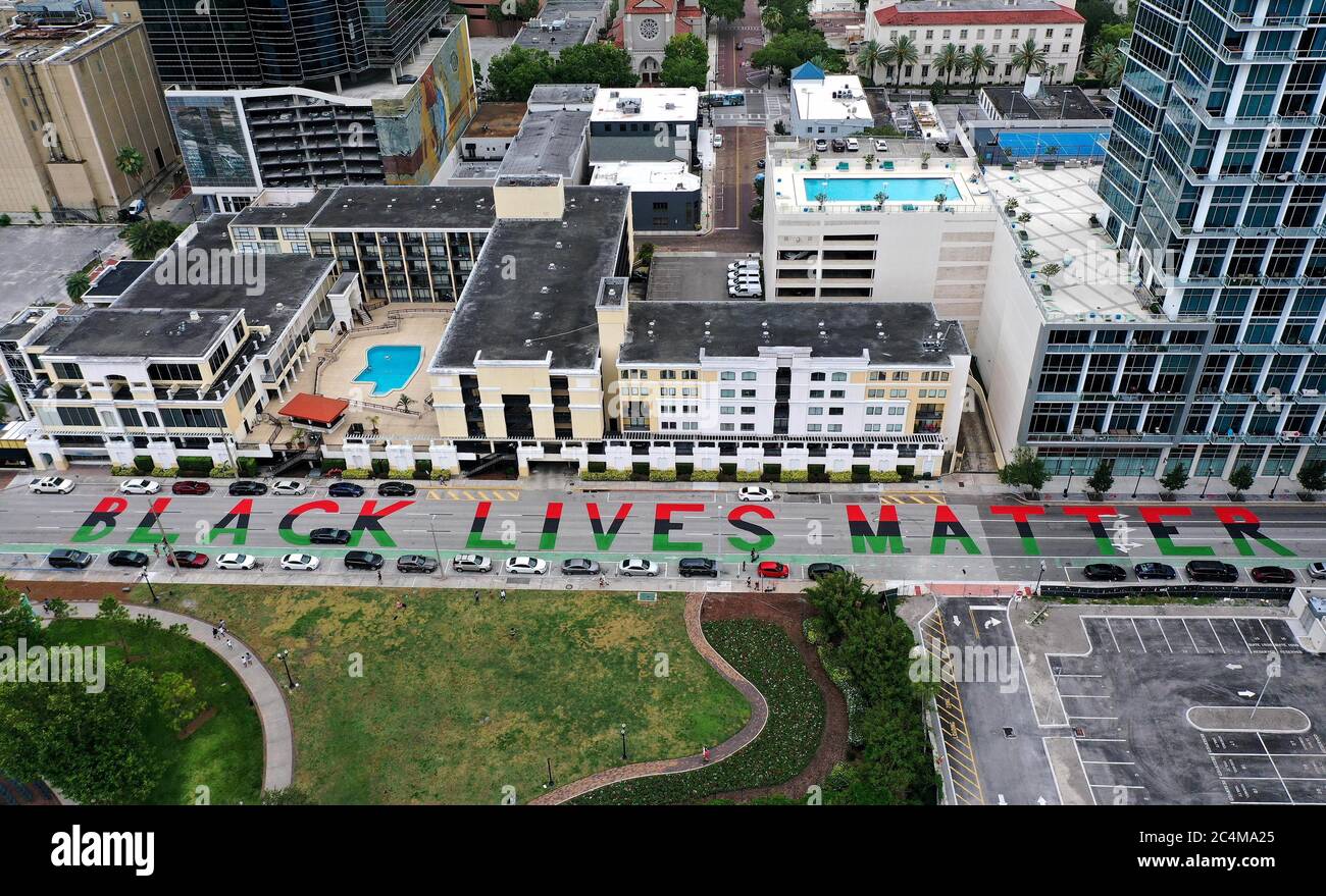 June 27, 2020 - Orlando, Florida, United States - A 400-foot-long 'Black Lives Matter' street mural is seen on June 27, 2020 after being completed the day before across from Lake Eola Park in downtown Orlando, Florida. Similar paintings have appeared in dozens of U.S. cities in the wake of protests in response to the killing of 46-year-old George Floyd in Minneapolis on May 25, 2020. (Paul Hennessy/Alamy Live News) Stock Photo