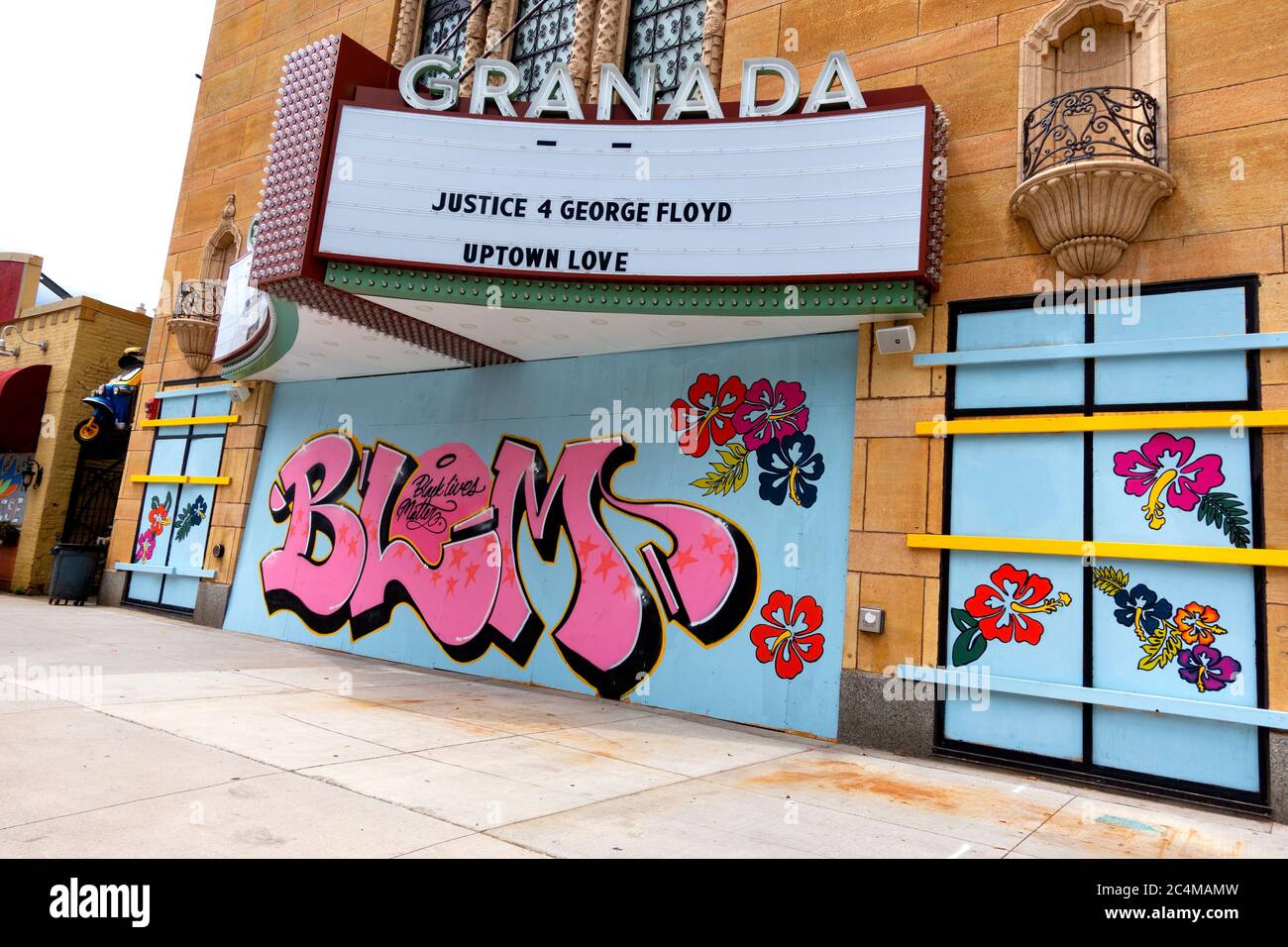 Boarded up windows protecting The Granada Theater in the Uptown Area