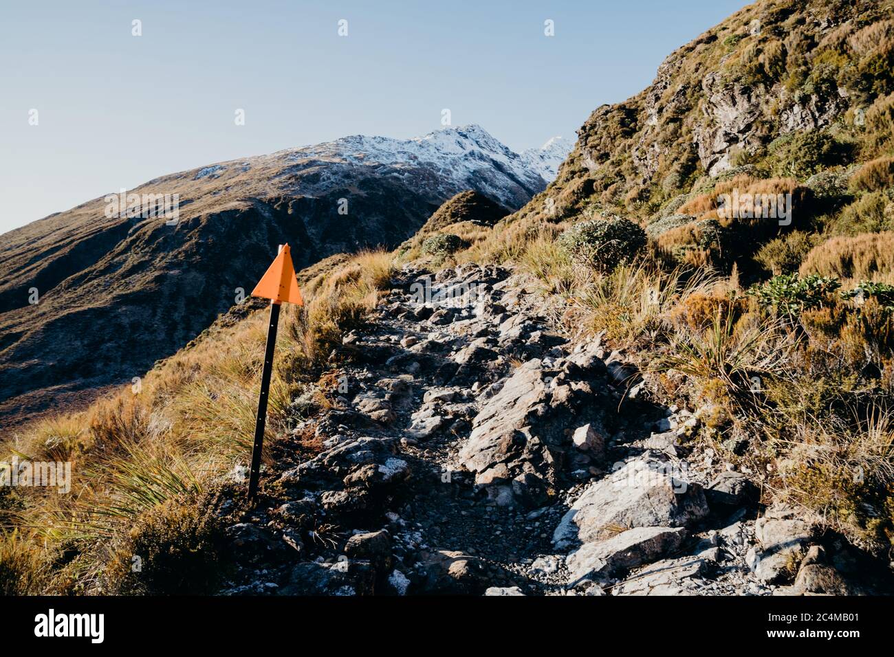 The way to the top of the Temple basin, New Zealand. Stone path in the mountains to the ski field. Stock Photo